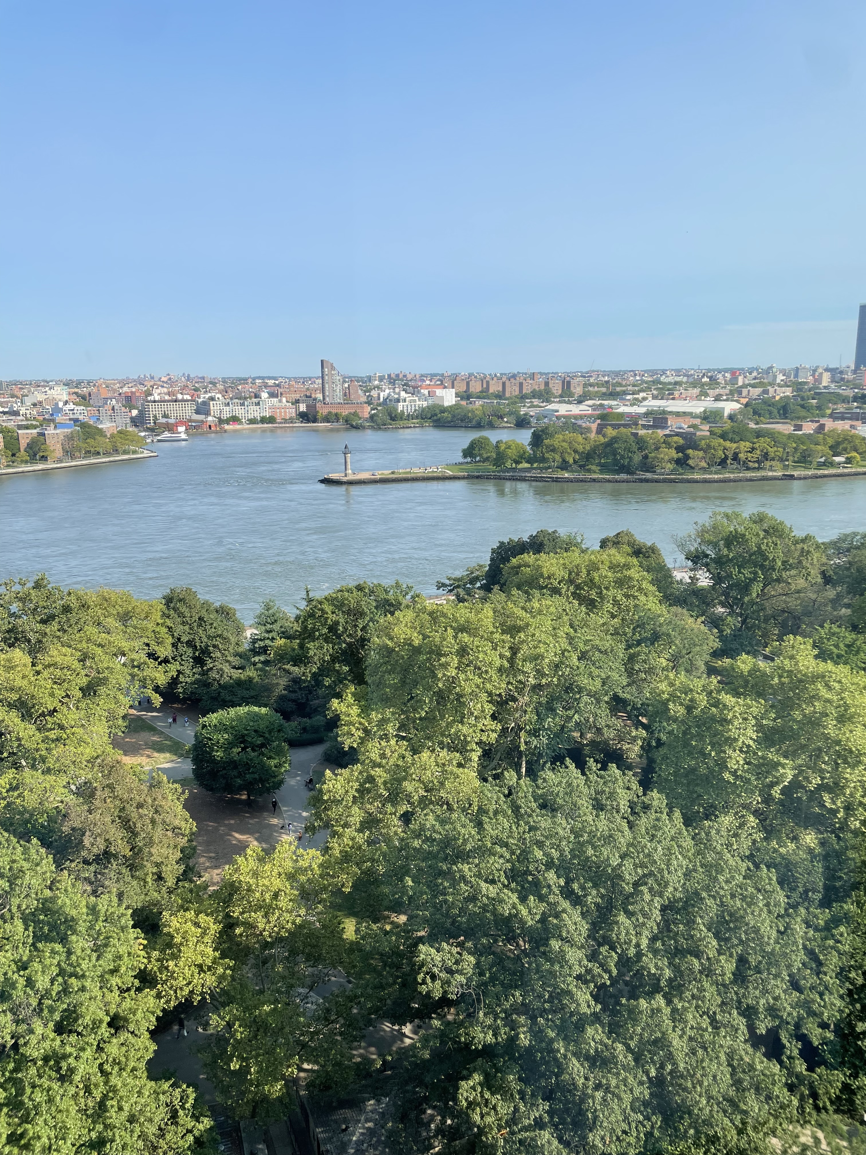 170 East End Avenue, Unit 16B Manhattan, NY 10128 - Photo 13 of 21 a view of a lake with houses in the back