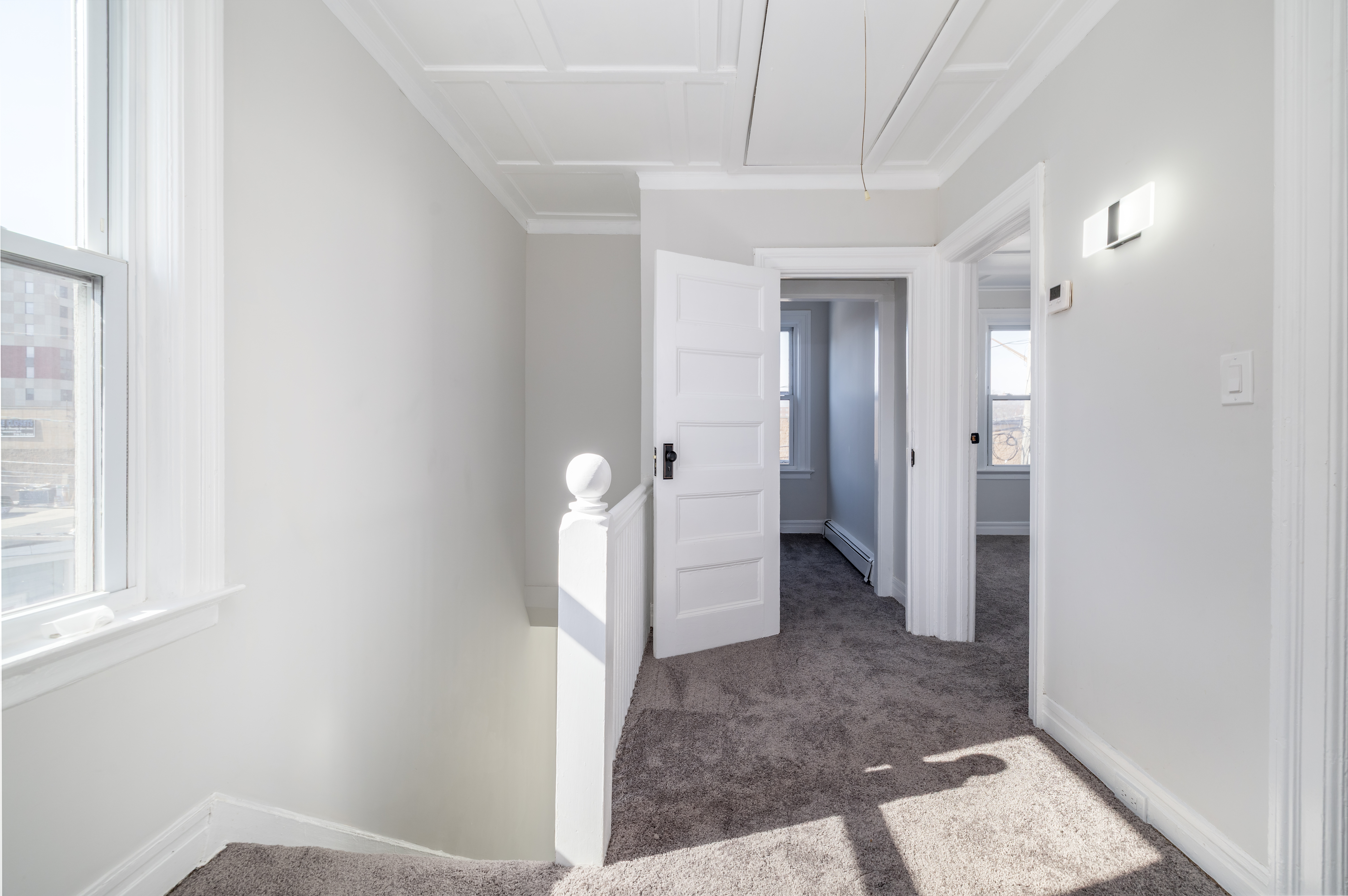 13-03 Brunswick Avenue Queens, NY 11691 - Photo 14 of 27 a view of a bathroom with a sink and a mirror