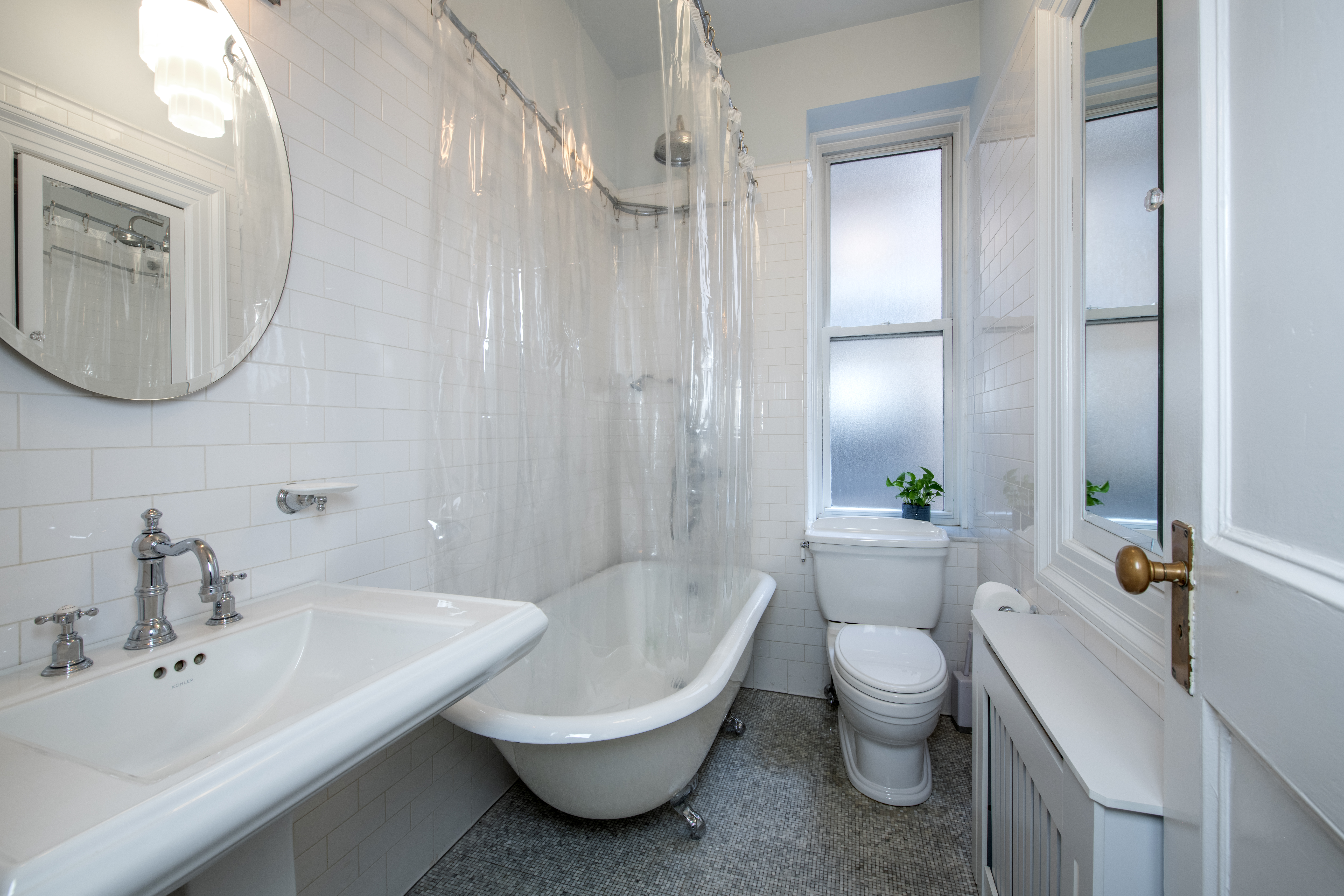 194 Riverside Drive, Unit 5C/6C Manhattan, NY 10025 - Photo 10 of 26 a bathroom with a sink a toilet and shower