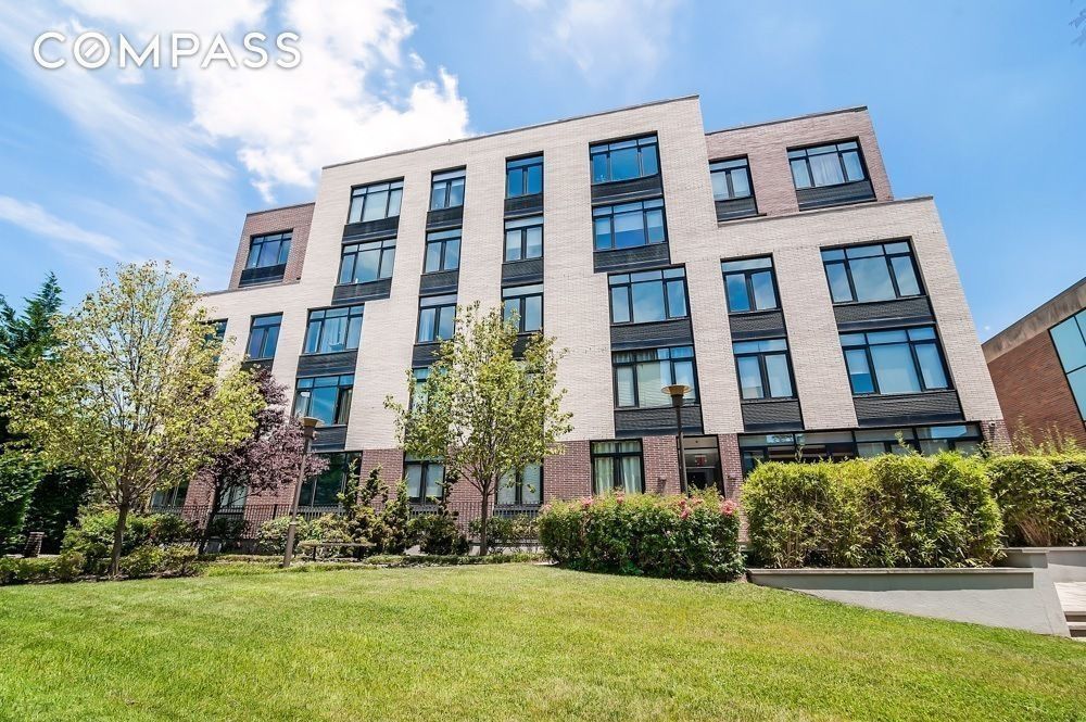 125 North 5th Street, Unit 2A Brooklyn, NY 11249 - Photo 5 of 10 a front view of a multi story residential apartment building
