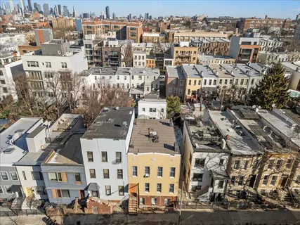 a view of a city with tall buildings