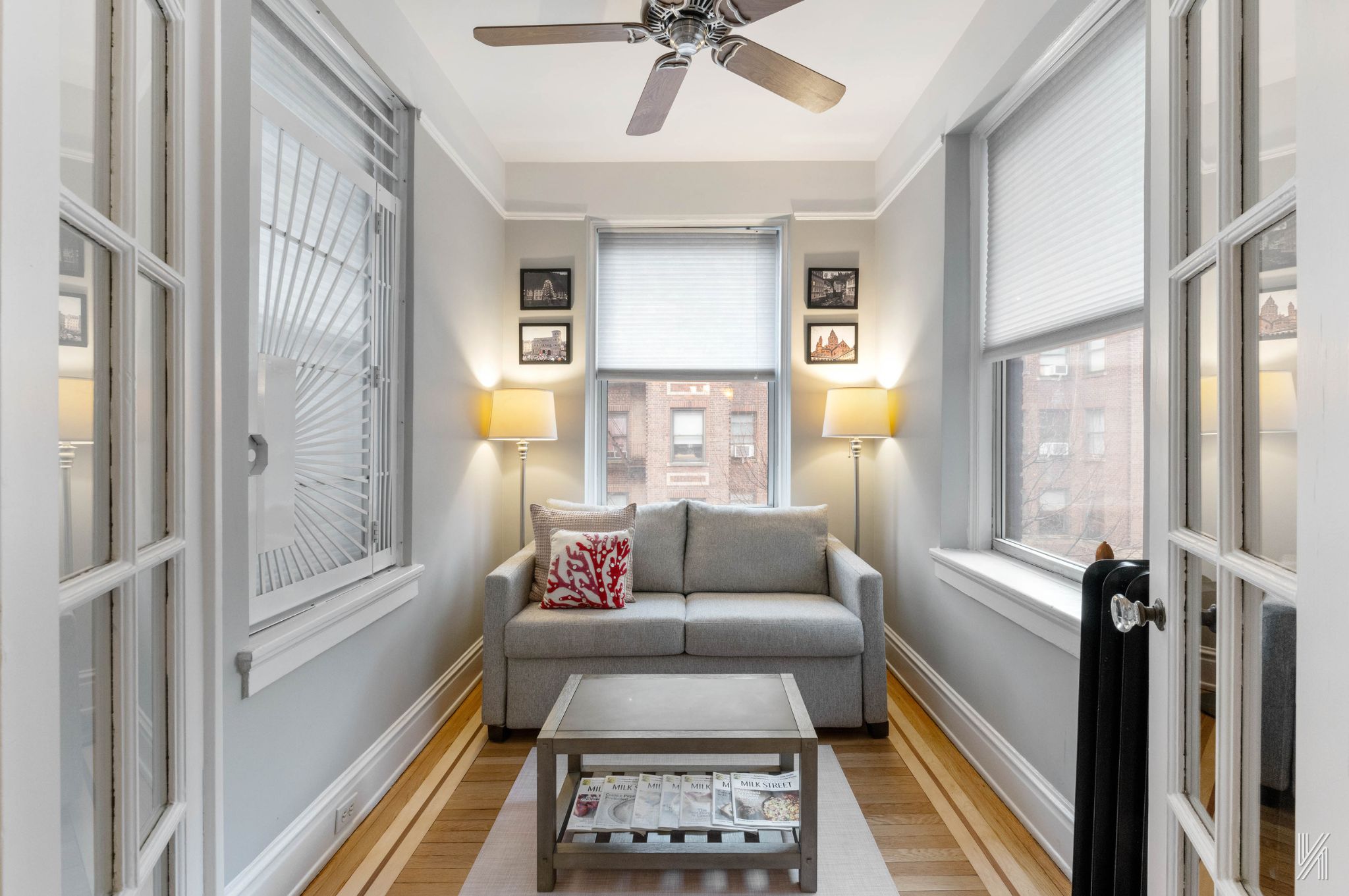 37-22 80th Street, Unit 31 Queens, NY 11372 - Photo 9 of 21 a living room with furniture and a window