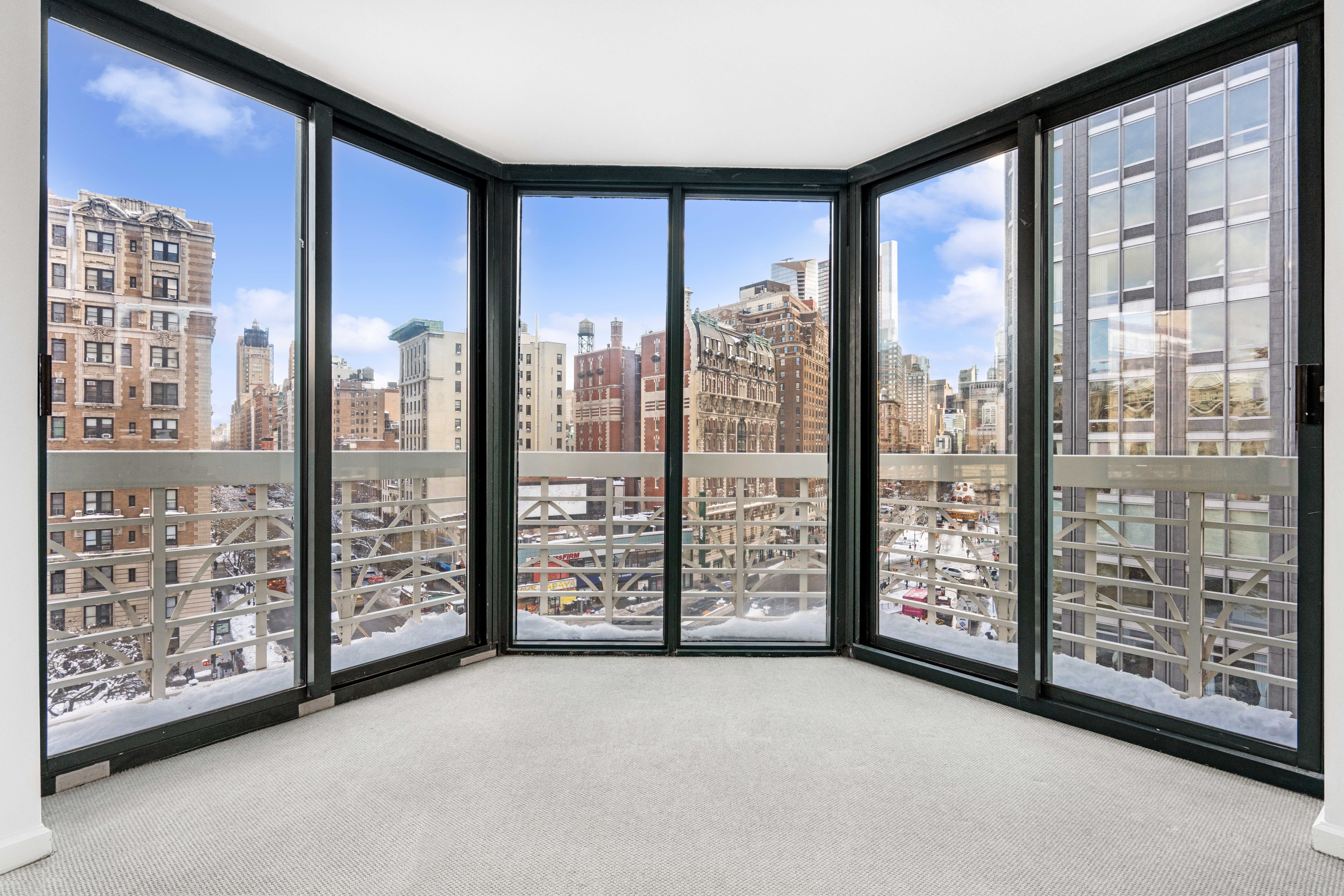 201 West 72nd Street, Unit 8A Manhattan, NY 10023 - Photo 4 of 15 a view of an empty room with windows