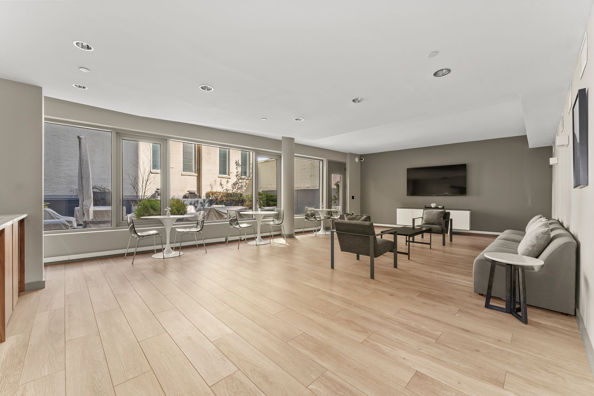 425 West 53rd Street, Unit 416 Manhattan, NY 10019 - Photo 18 of 19 a view of a living room filled with furniture