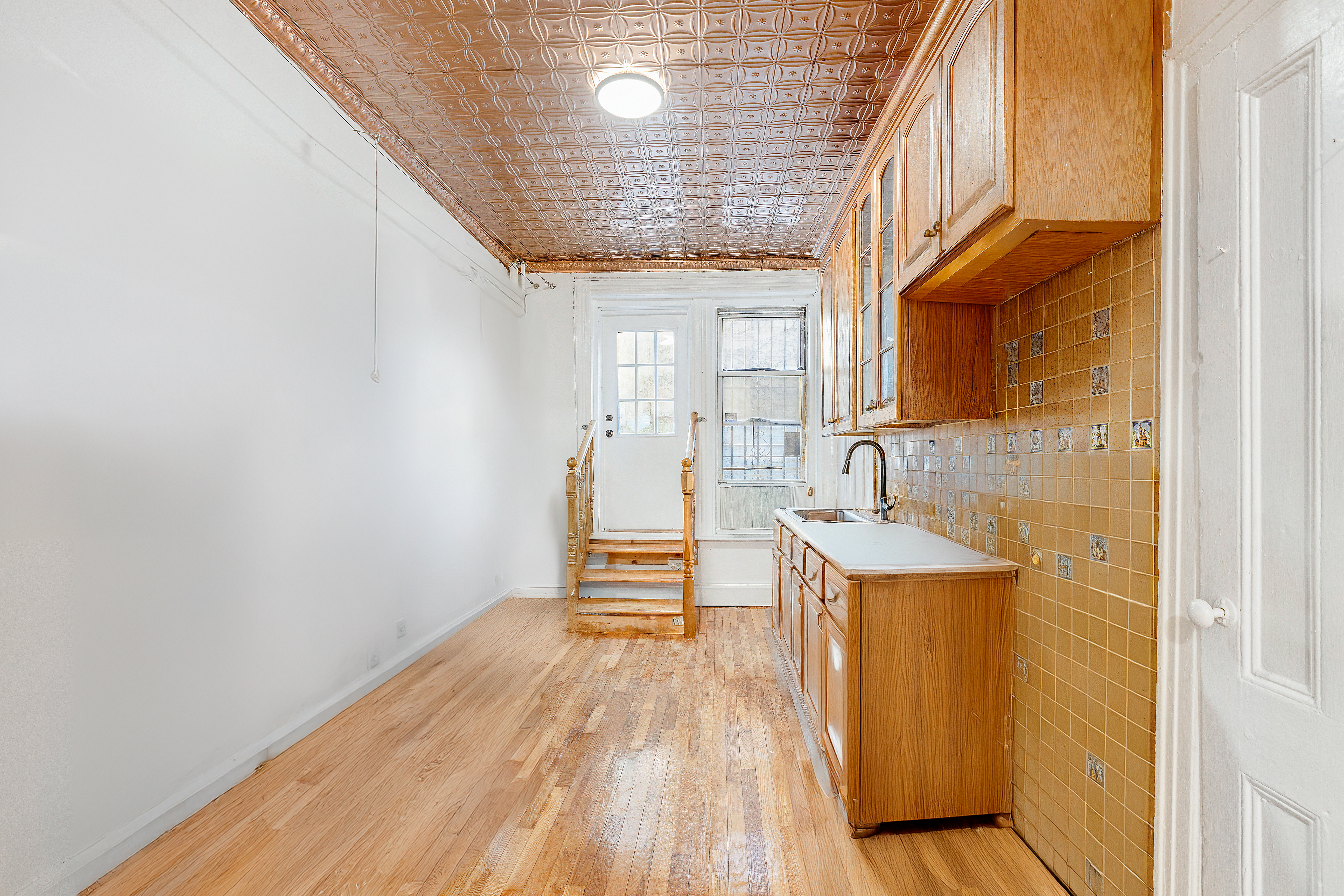 639 President Street, Unit 1L Brooklyn, NY 11215 - Photo 3 of 12 a view of a kitchen with a sink and cabinets