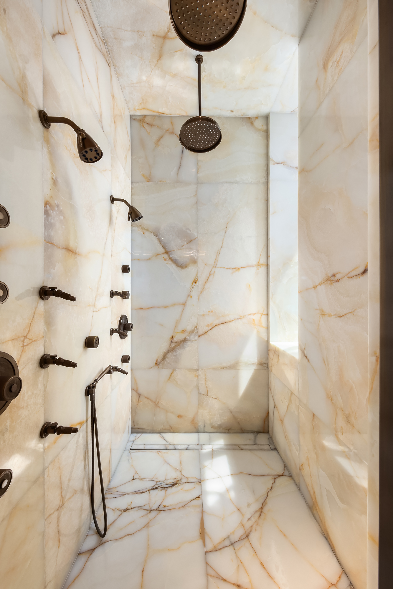 111 West 57th Street, Unit 46 Manhattan, NY 10019 - Photo 8 of 14 a bathroom with a shower