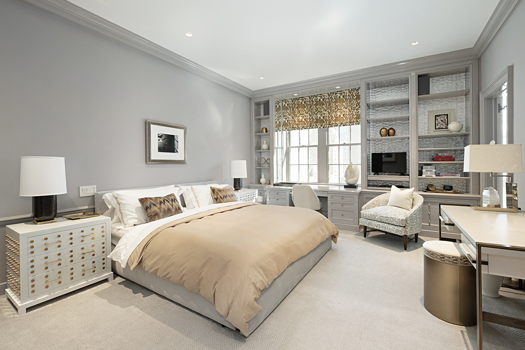 730 Park Avenue, Unit 7/8A Manhattan, NY 10021 - Photo 19 of 26 a bedroom with a bed couches and a flat tv screen