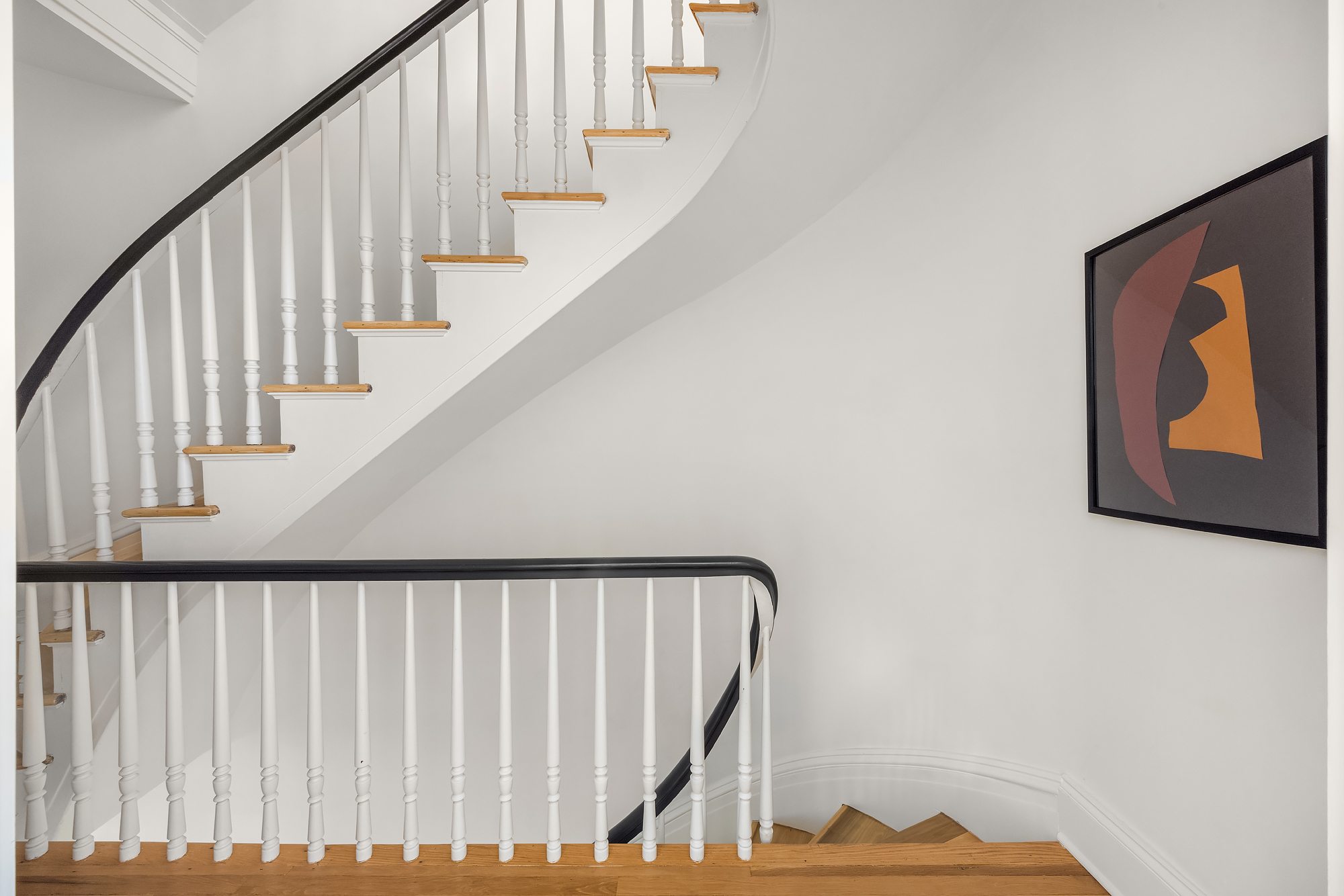 112 West 13th Street Manhattan, NY 10011 - Photo 32 of 46 a view of staircase with rug