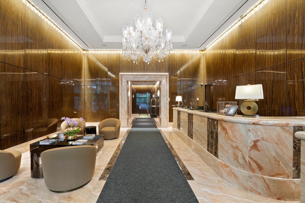 1 Central Park West, Unit 1506 Manhattan, NY 10023 - Photo 13 of 16 a lobby with furniture and chandelier