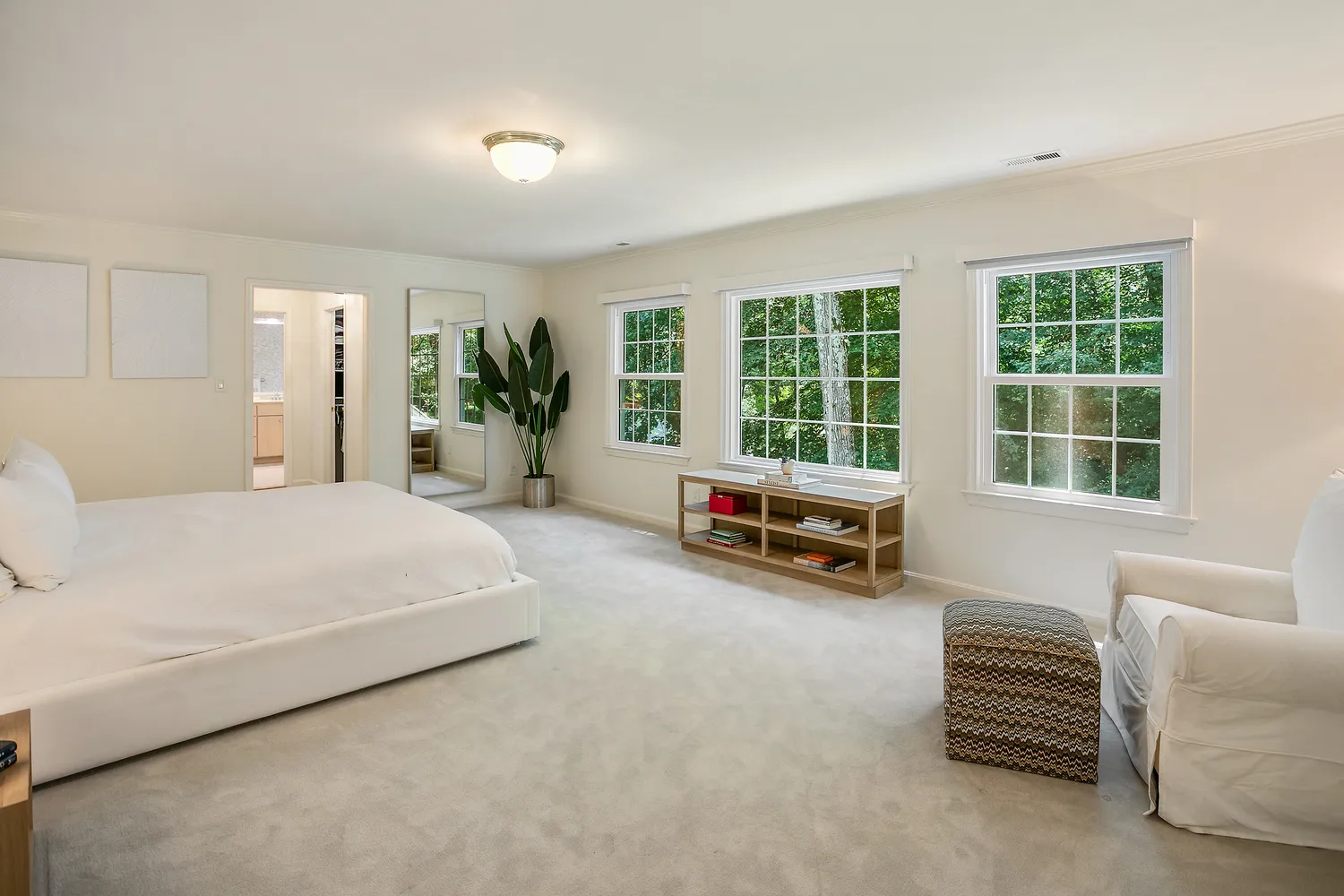 a bed room with a bed and a couch