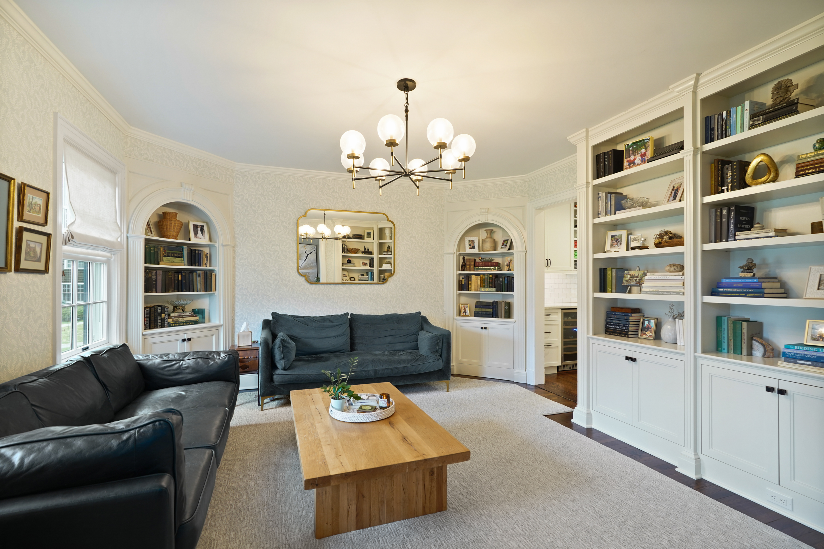 15 Anderson Road Greenwich, CT 06830 - Photo 6 of 30 a living room with furniture and a bookshelf