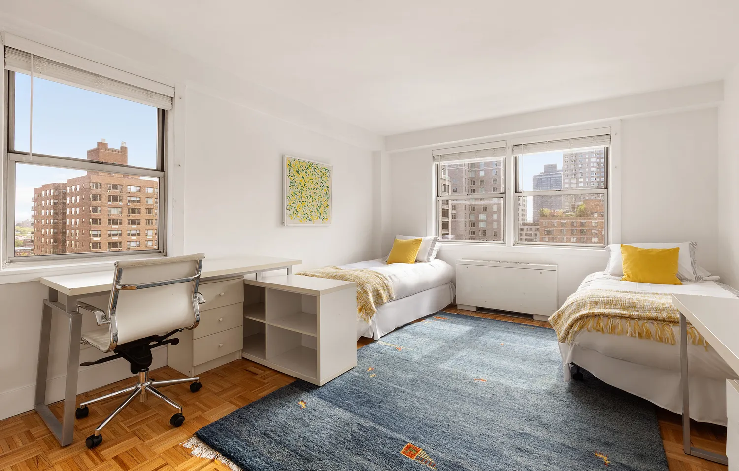 a spacious bedroom with a bed and a table