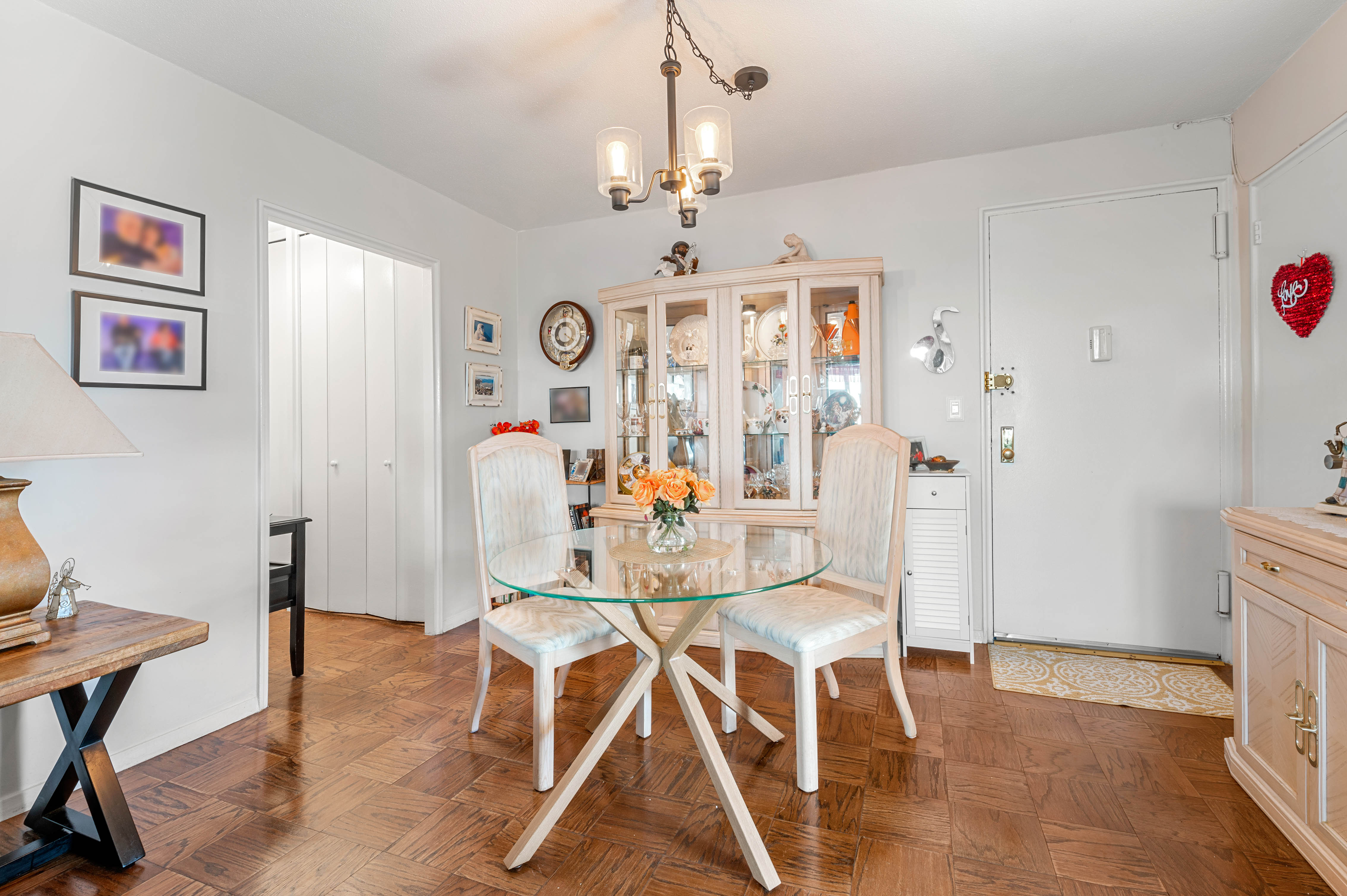 70-31 108th Street, Unit 9C Queens, NY 11375 - Photo 2 of 11 a view of a livingroom and dining room