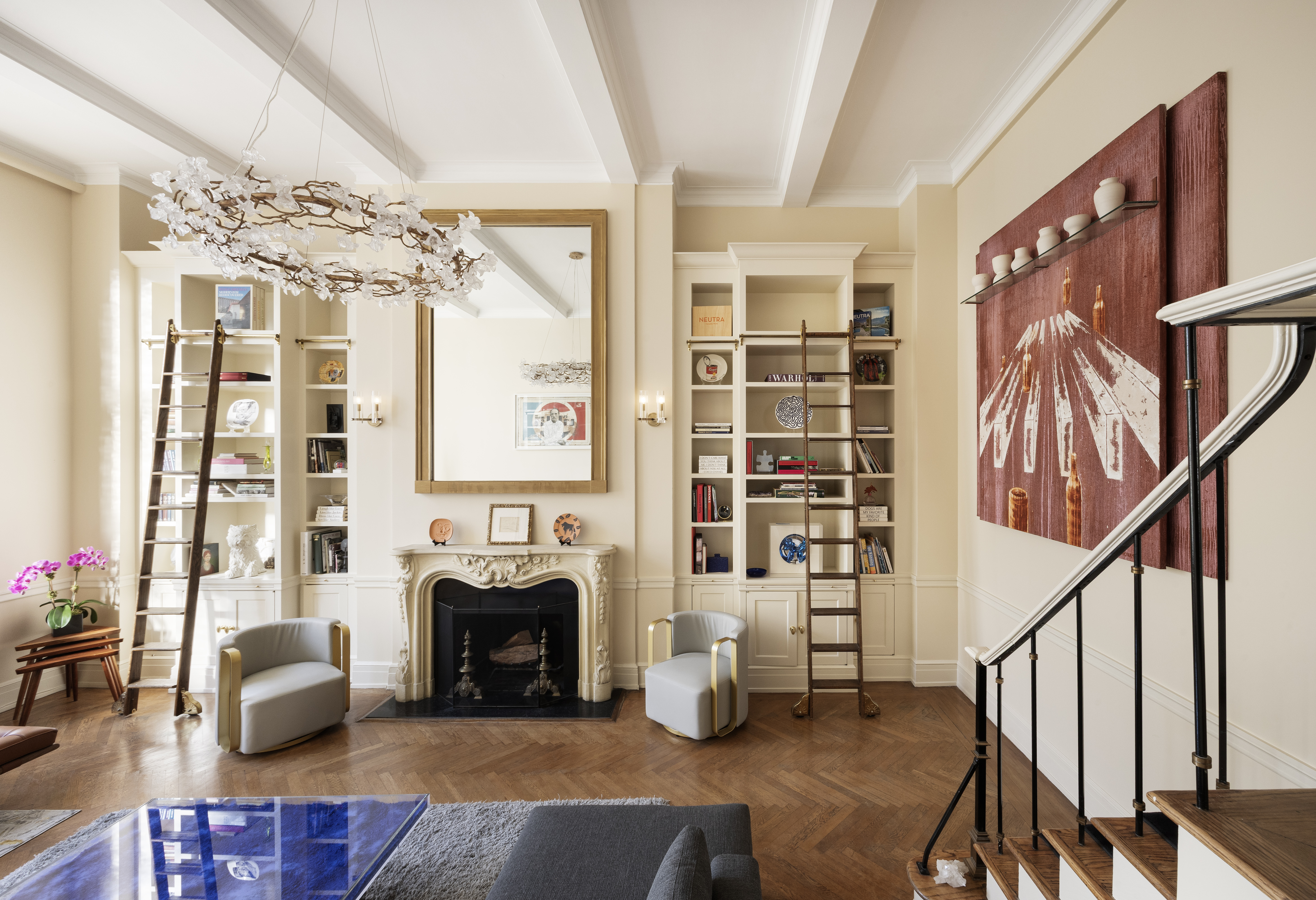 14 East 75th Street, Unit 7E Manhattan, NY 10021 - Photo 2 of 13 a living room with furniture and a fireplace