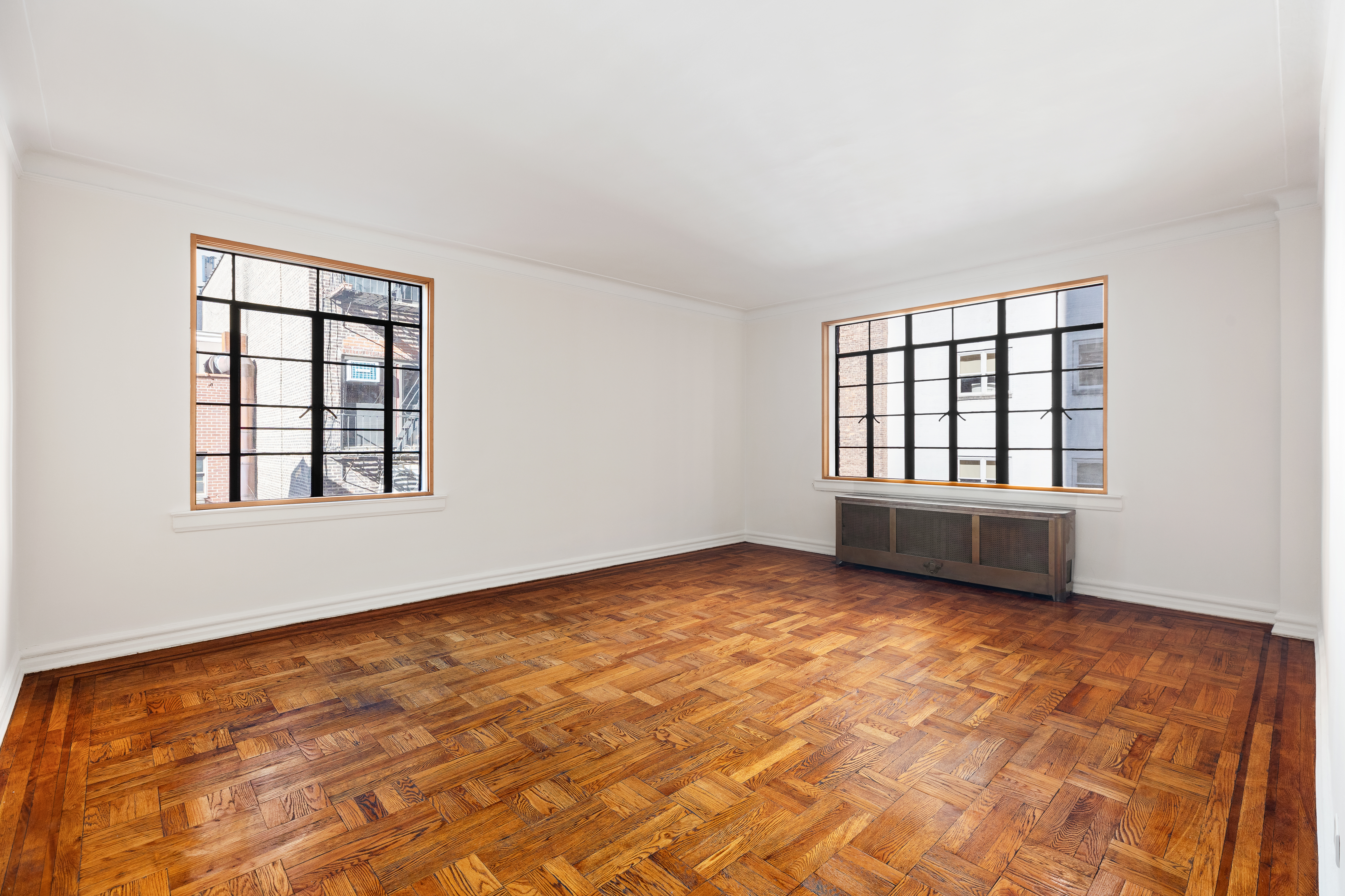 135 East 39th Street, Unit 5E Manhattan, NY 10016 - Photo 2 of 13 an empty room with window