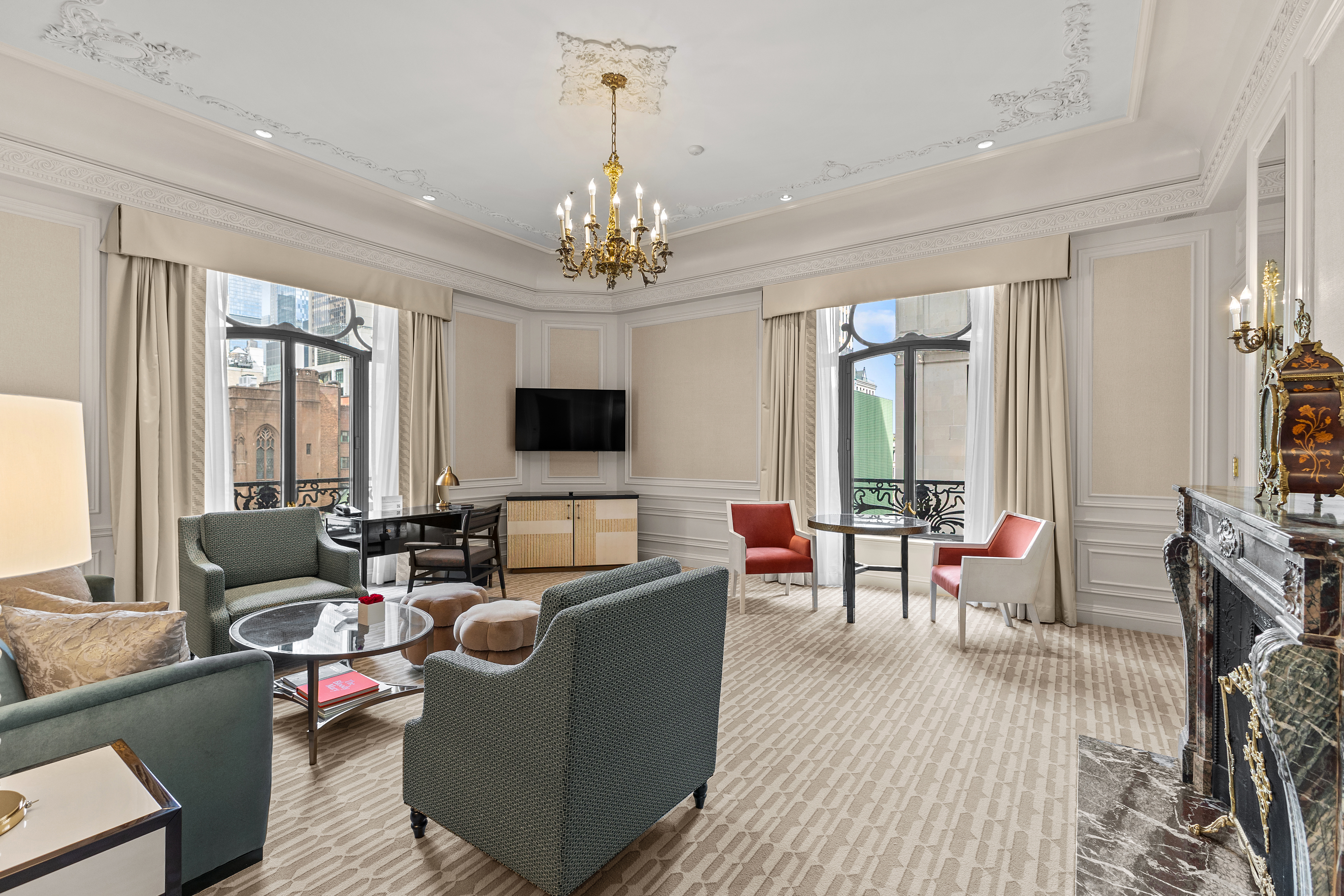 2 East 55th Street, Unit 918W17 Manhattan, NY 10022 - Photo 1 of 14 a living room with furniture or chandelier and a wooden floor