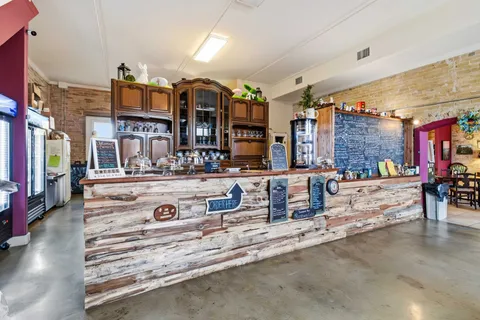 a room with furniture and a baby crib