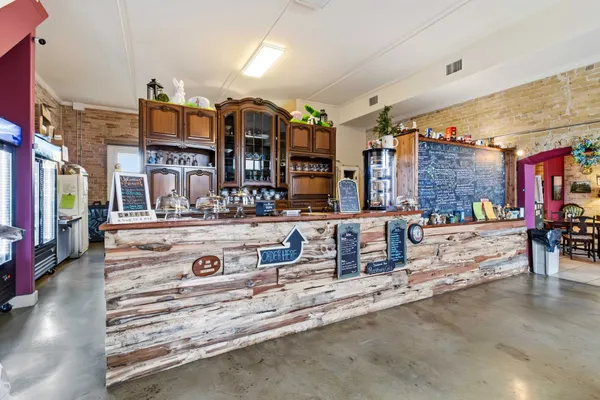 a room with furniture and a baby crib