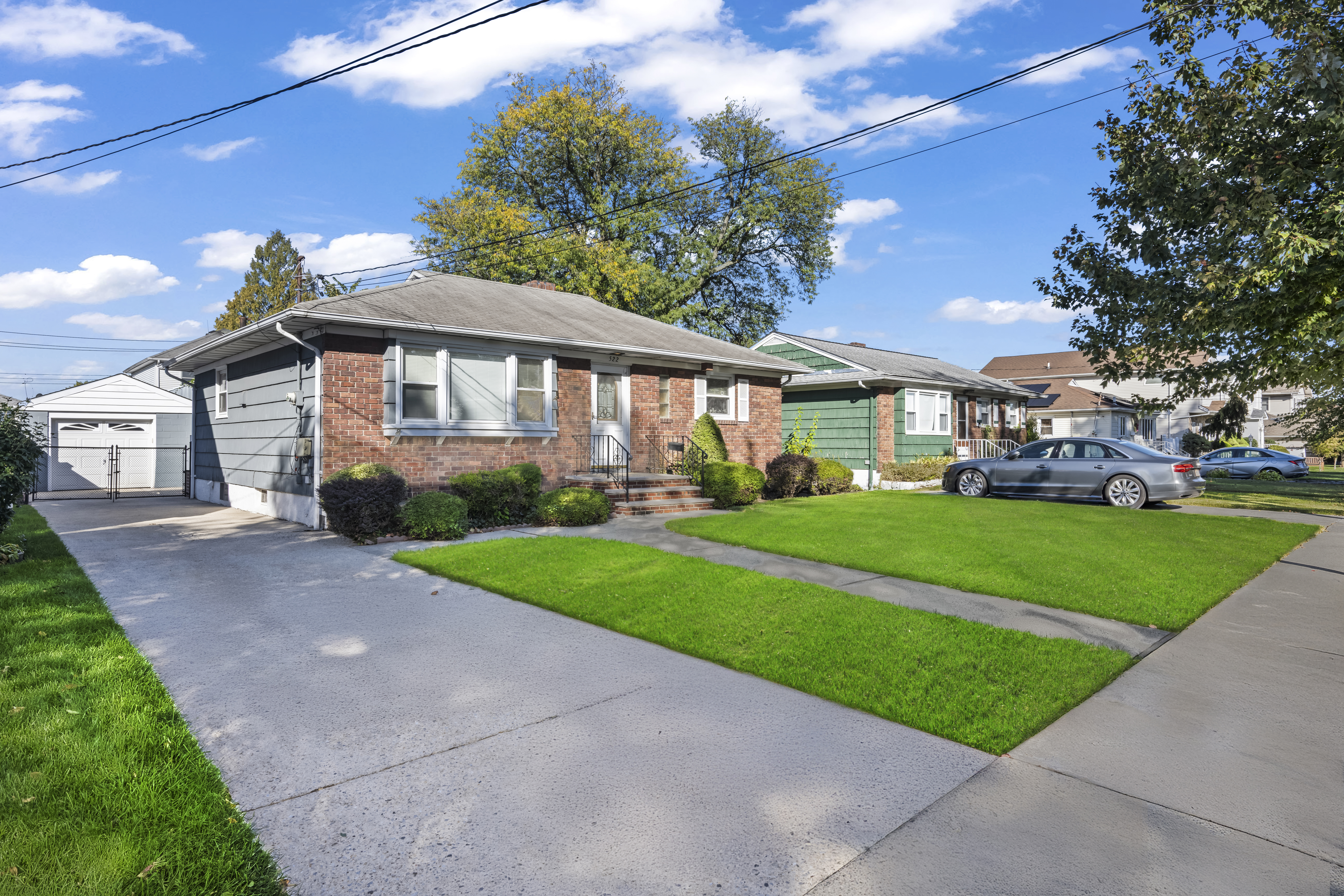 522 Stewart Avenue Staten Island, NY 10314 - Photo 4 of 33 a front view of a house with a yard
