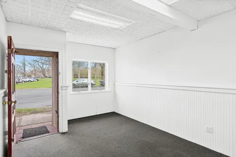a view of an empty room and window