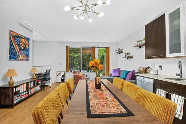 a very nice looking living room with a large window
