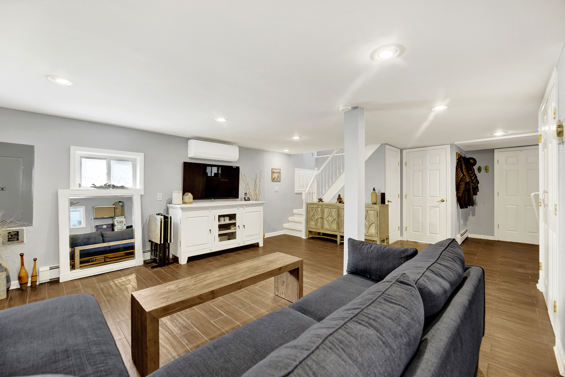 4-53 Beach 142nd Street Queens, NY 11694 - Photo 26 of 39 a living room with furniture and a flat screen tv