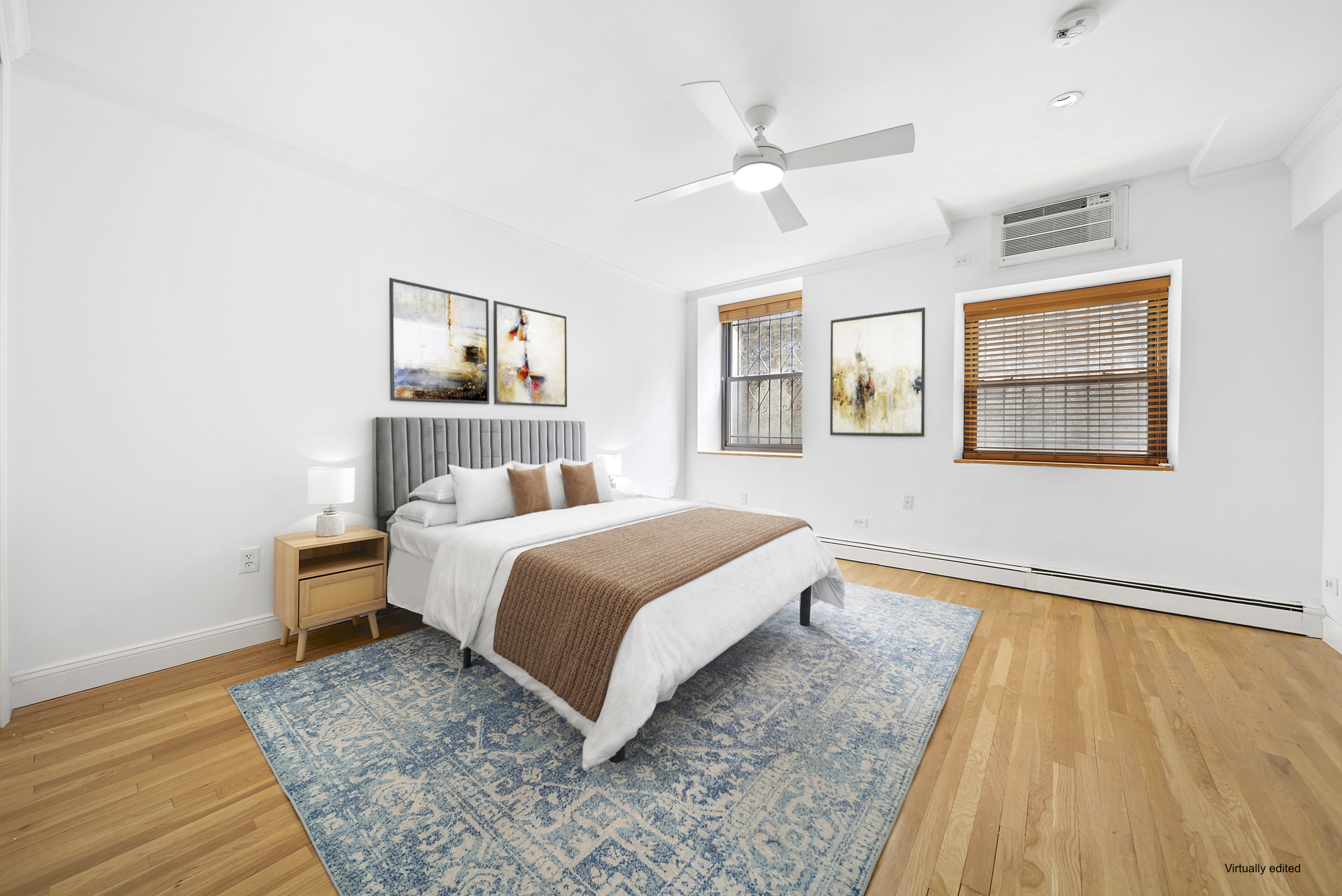255 West 95th Street, Unit 1B Manhattan, NY 10025 - Photo 7 of 12 a bedroom with a bed and wooden floor