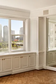 a view of a livingroom with an empty space and window