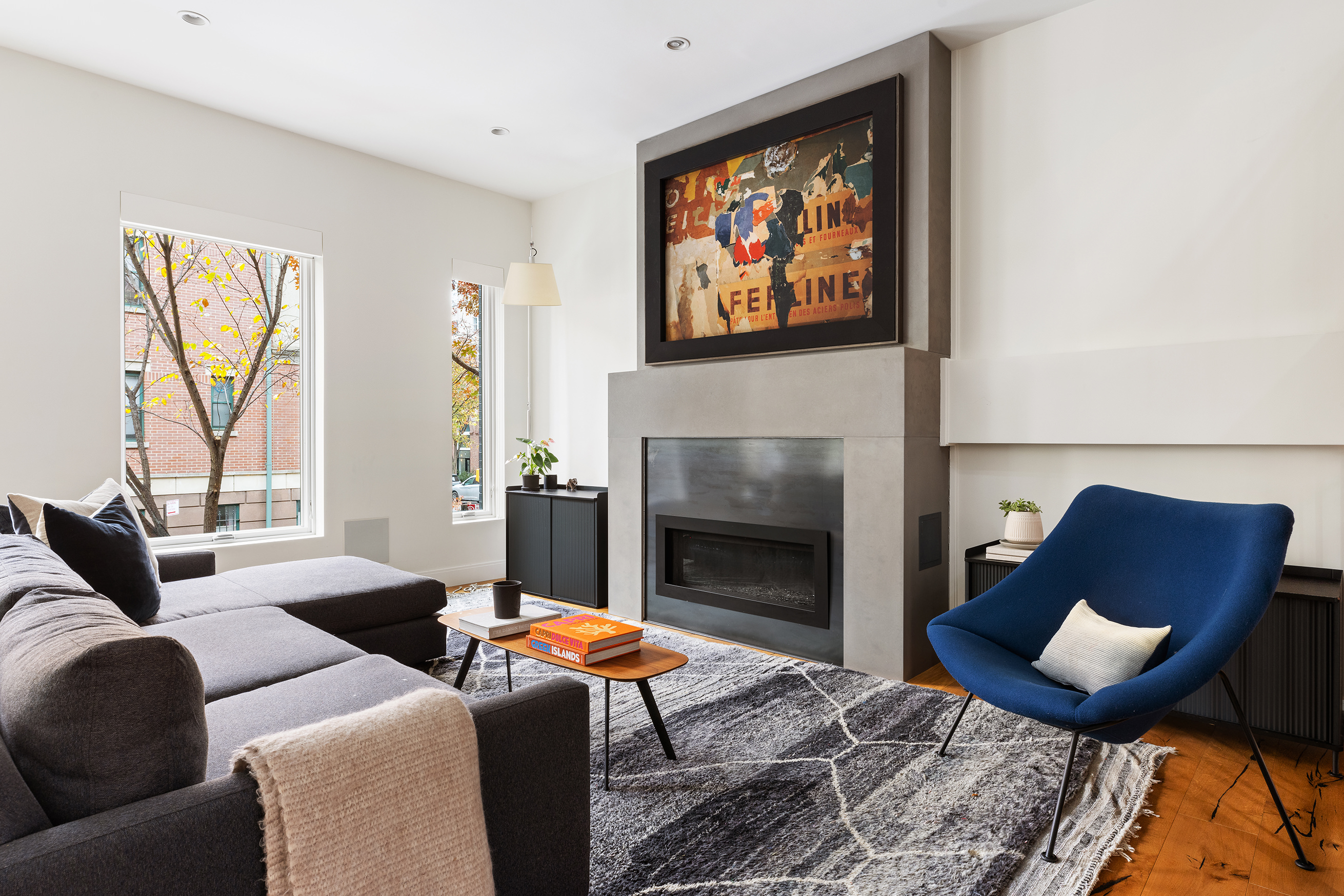 43 Dean Street Brooklyn, NY 11201 - Photo 3 of 17 a living room with furniture and a fireplace