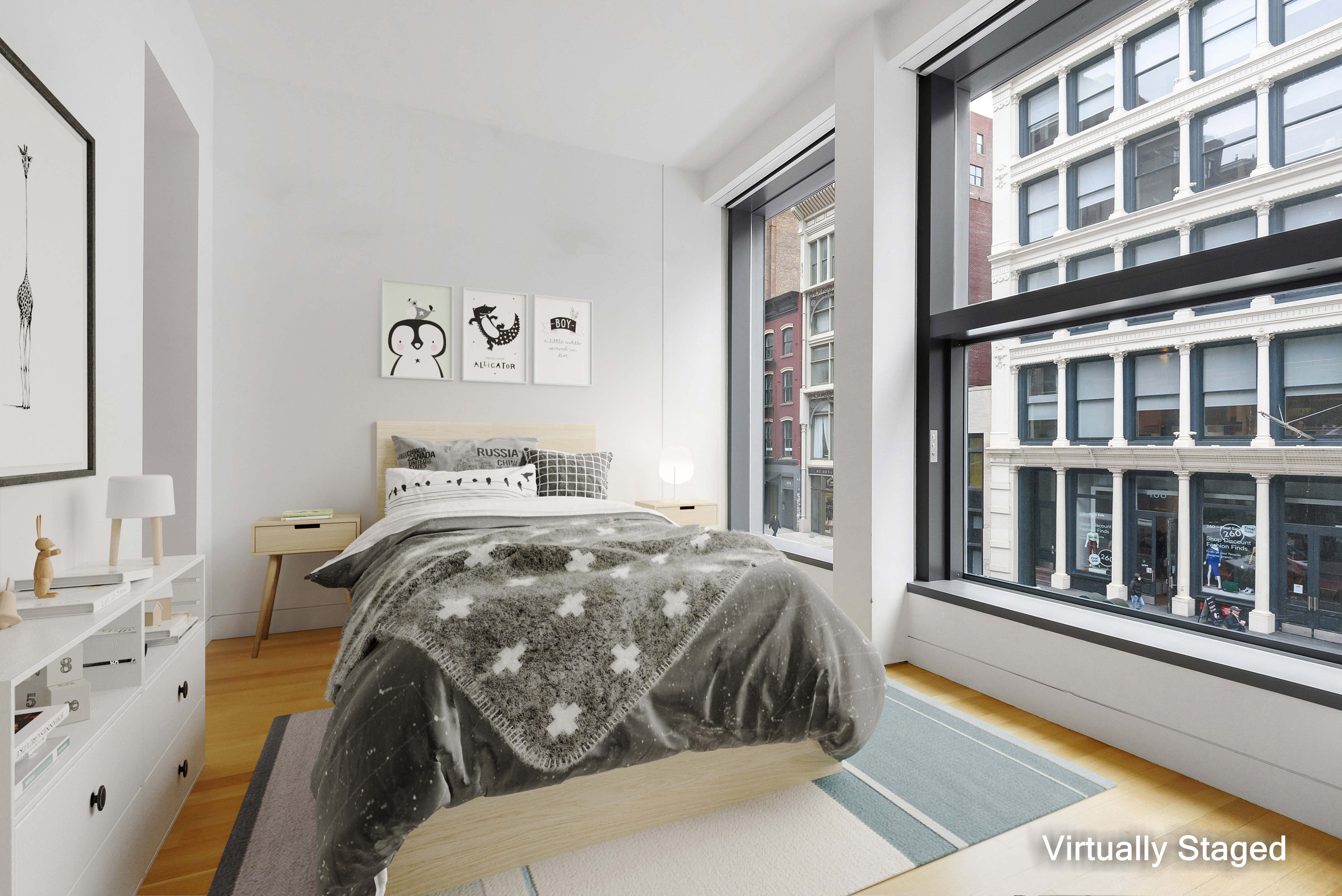 40 Mercer Street, Unit 19 Manhattan, NY 10013 - Photo 8 of 16 a bedroom with a bed and a large window