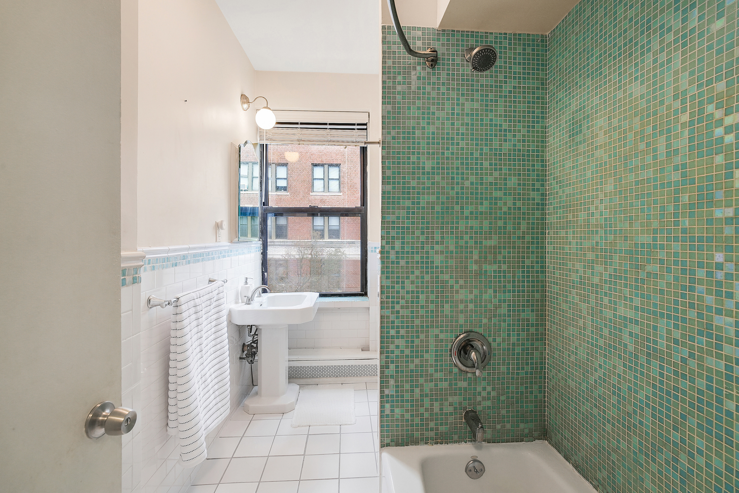 855 West End Avenue, Unit 4B Manhattan, NY 10025 - Photo 8 of 13 a bathroom with a shower toilet and a sink