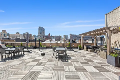 a view of a terrace with chairs