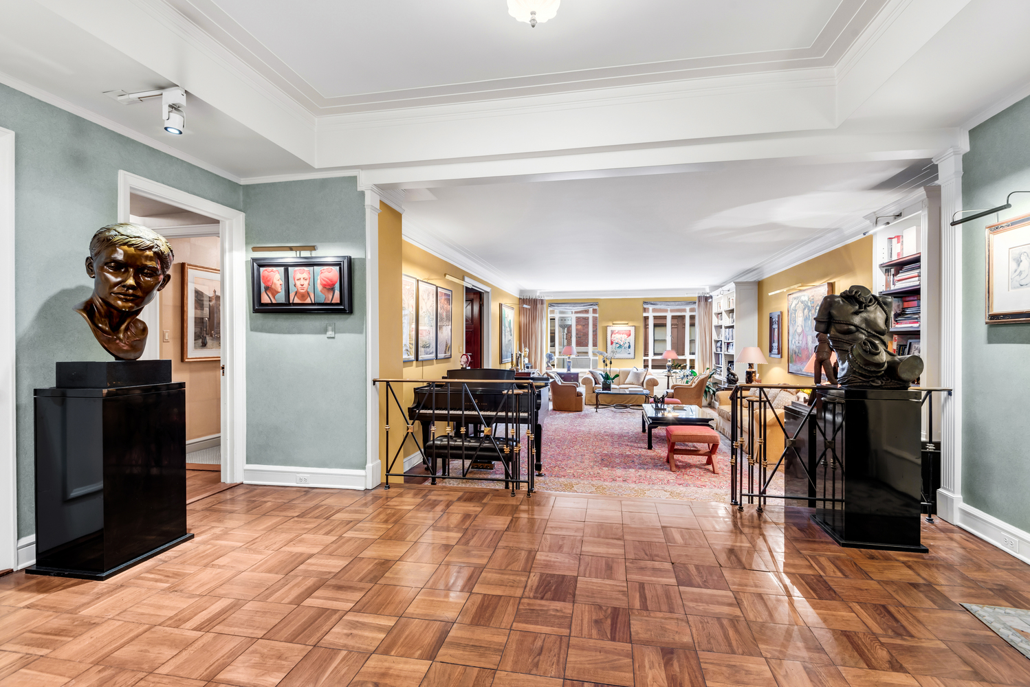 115 Central Park West, Unit 3B Manhattan, NY 10023 - Photo 4 of 20 a living room with furniture a flat screen tv and a stove