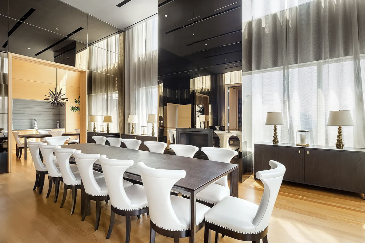 252 East 57th Street, Unit 60A Manhattan, NY 10022 - Photo 26 of 28 a dining room with furniture a chandelier and wooden floor