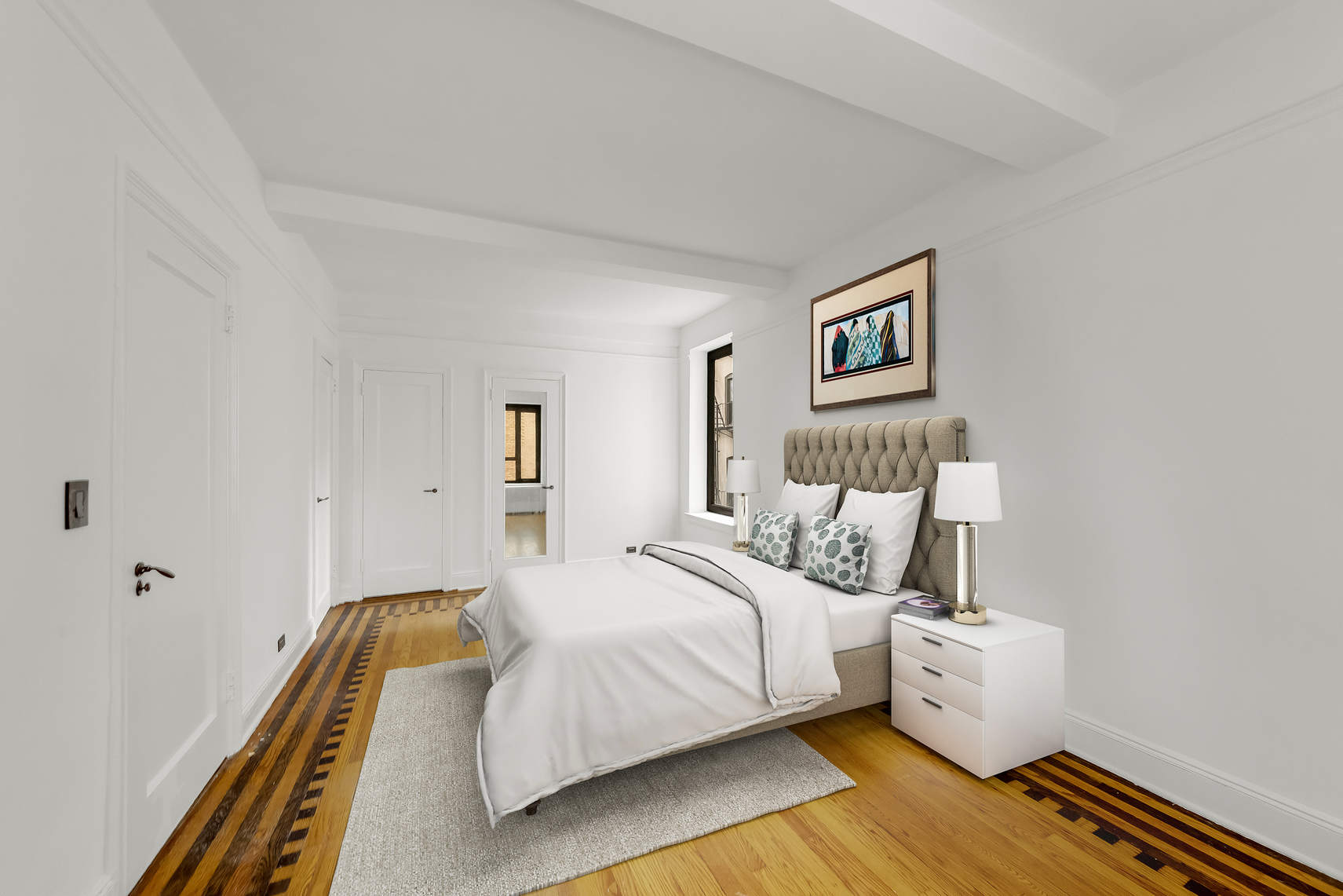 444 Central Park West, Unit 2H Manhattan, NY 10025 - Photo 4 of 16 a bedroom with a bed and a couch