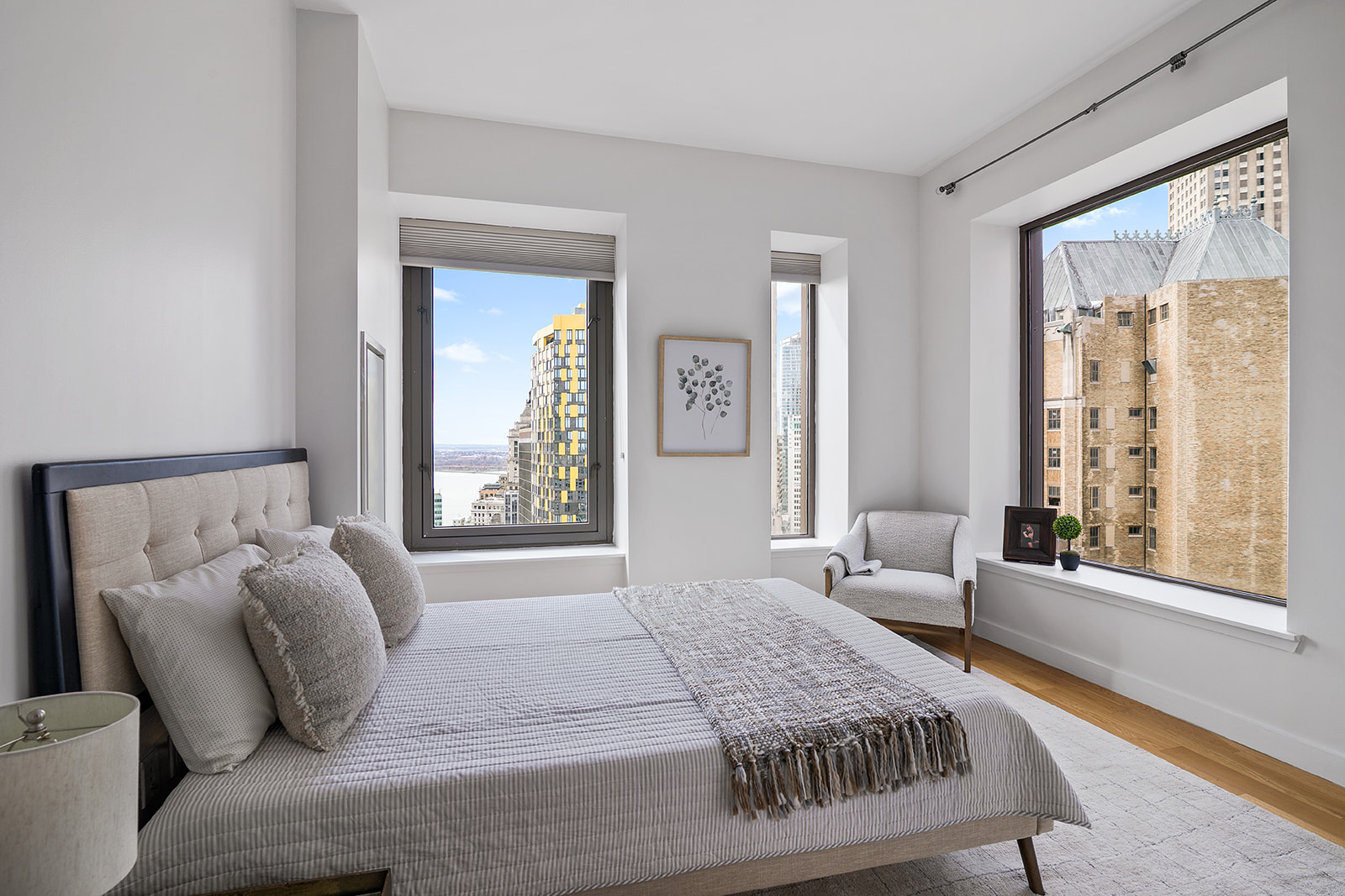 75 Wall Street, Unit 36F Manhattan, NY 10005 - Photo 4 of 15 a bedroom with bed and window