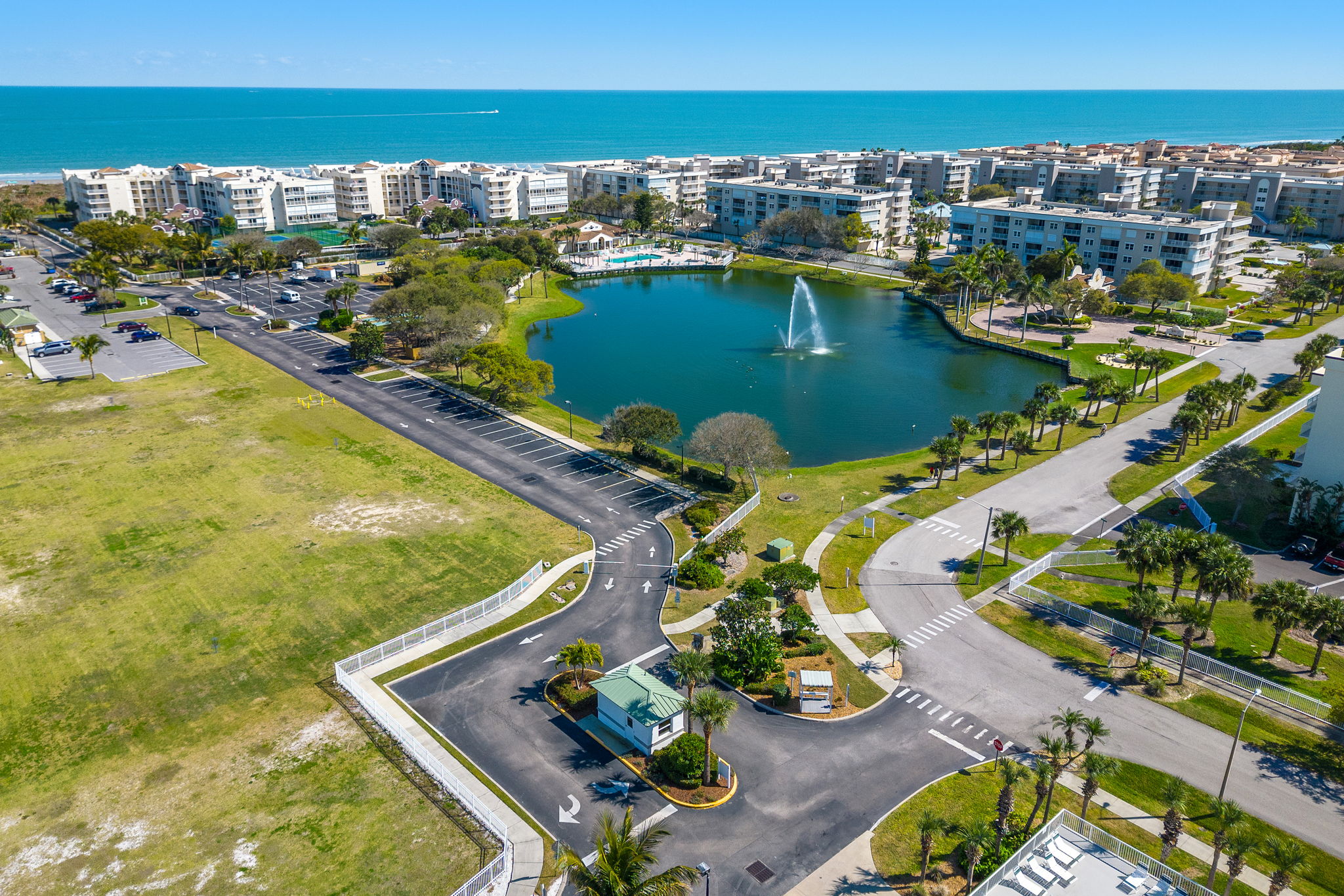 701 Solana Shores Drive, Unit 306 Cape Canaveral, FL 32920 - Photo 8 of 23 an aerial view of water body with boats and residential houses with outdoor space