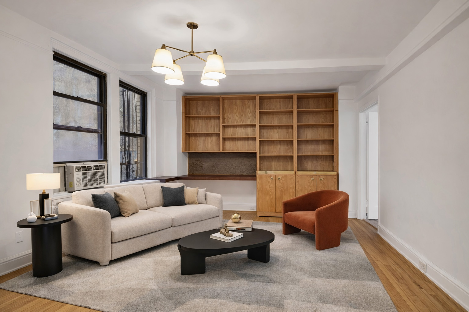 74 West 68th Street, Unit 5A Manhattan, NY 10023 - Photo 3 of 25 a living room with furniture and a large window