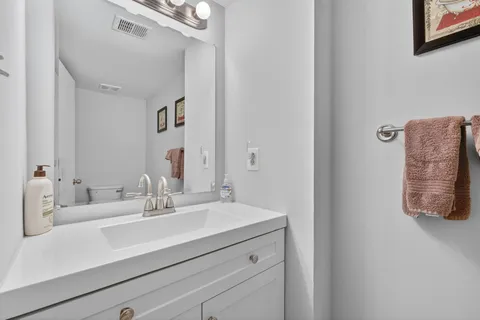 a view of a backyard with chairs