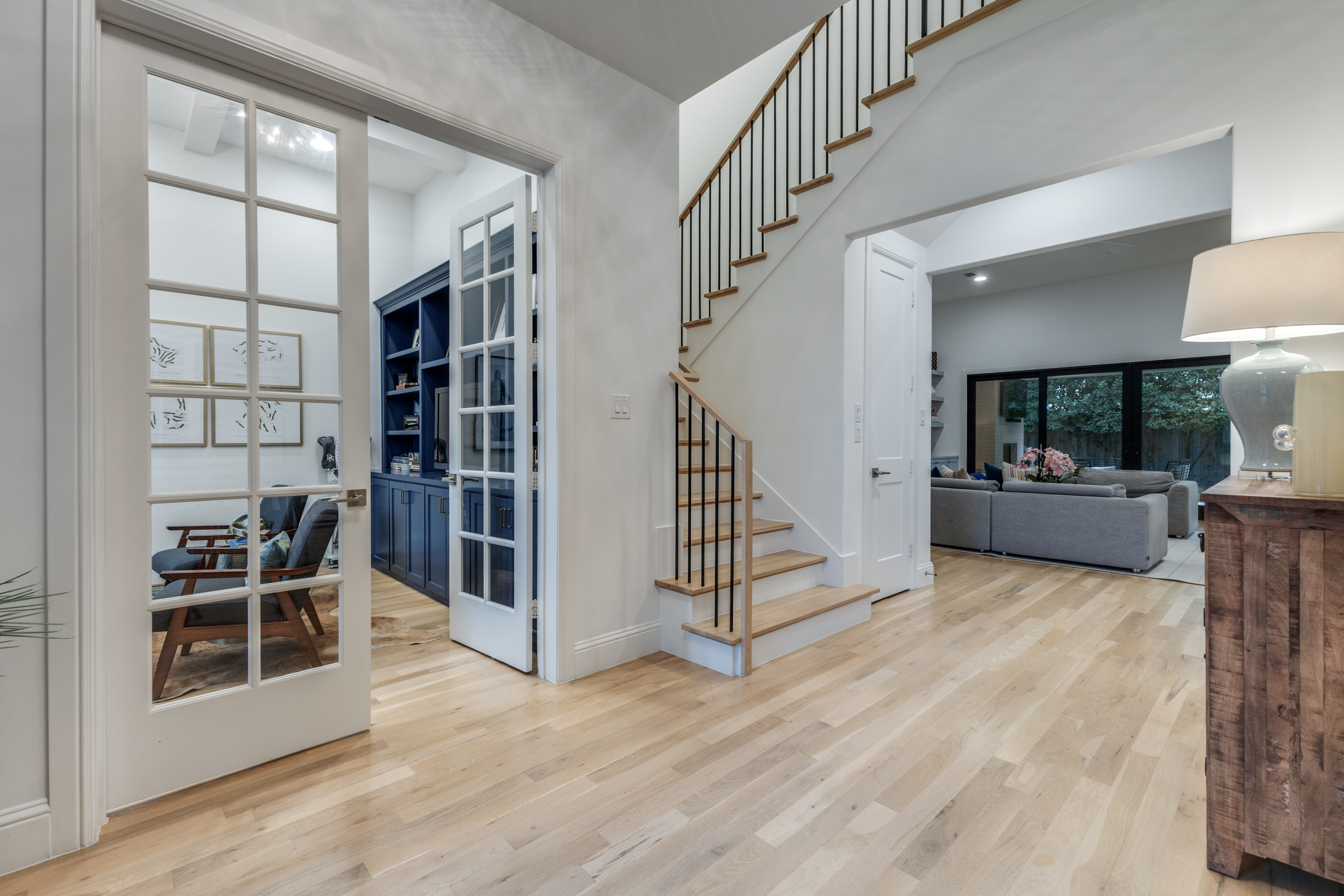 4042 Dunhaven Road Dallas, TX 75220 - Photo 7 of 34 a view of entryway and hall with wooden floor