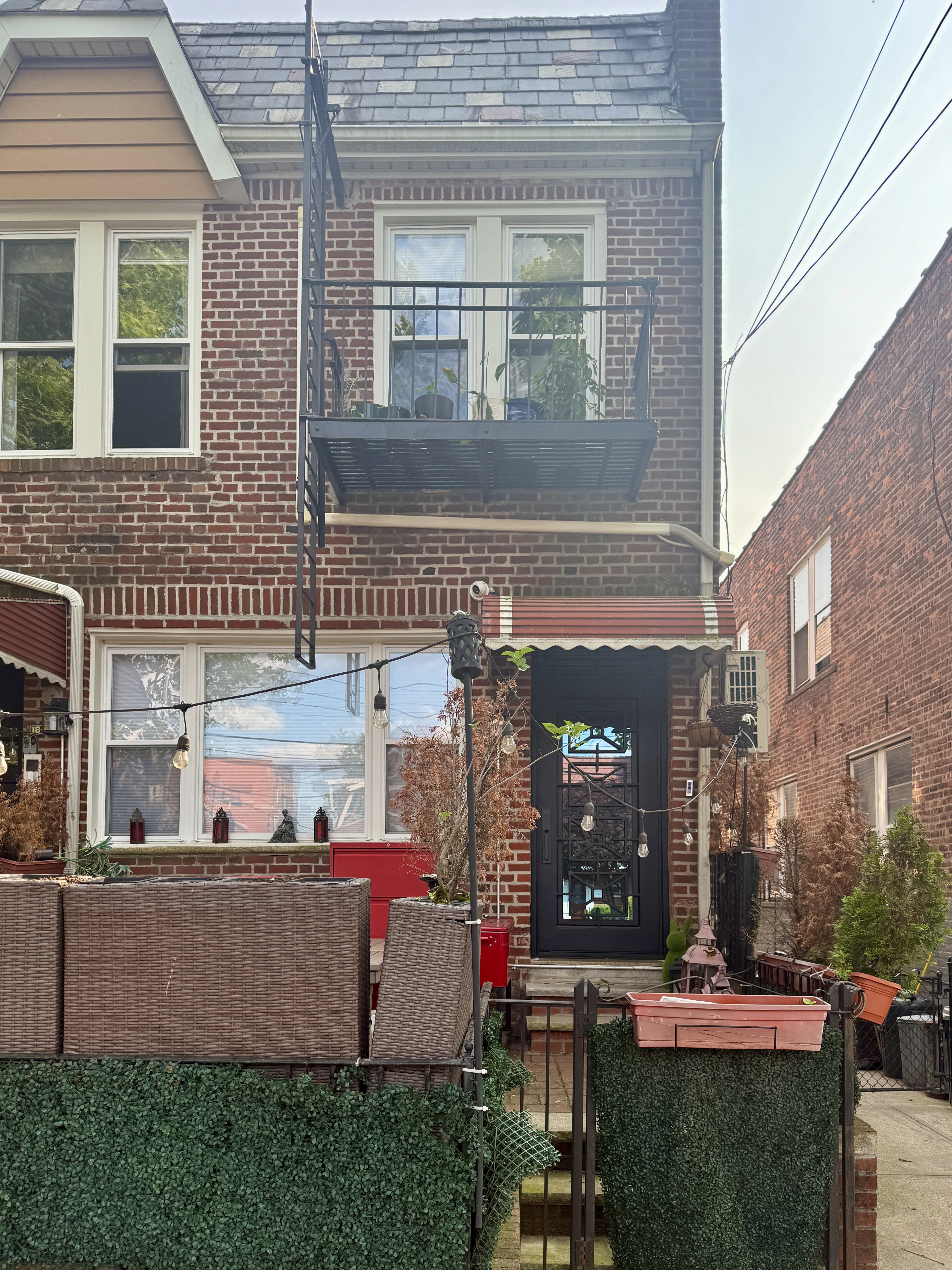 18-48 21st Drive, Unit 2R Queens, NY 11105 - Photo 7 of 7 a view of outdoor space and yard