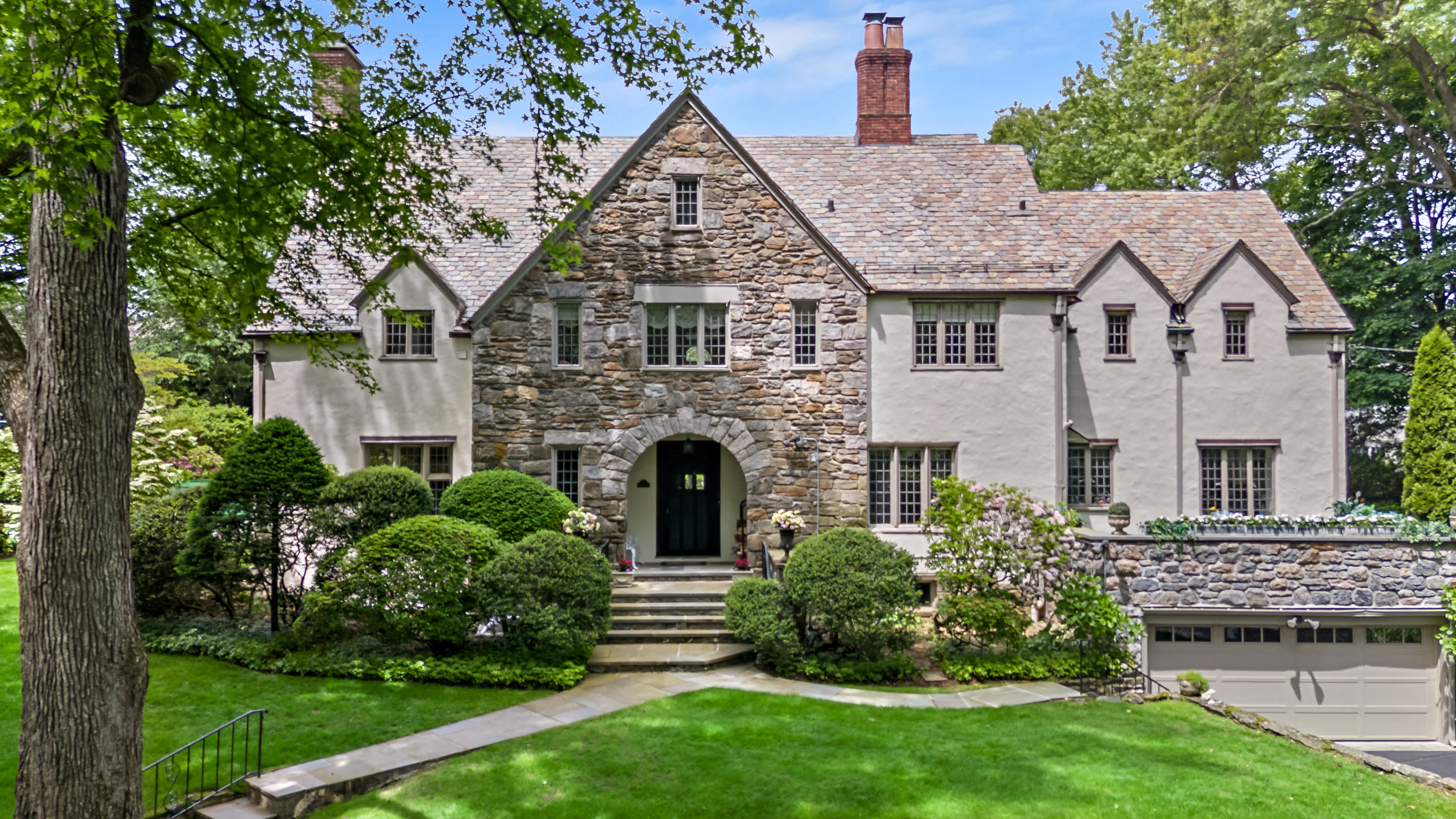 19 Avon Road Larchmont, NY 10538 - Photo 31 of 35 a aerial view of a house next to a yard