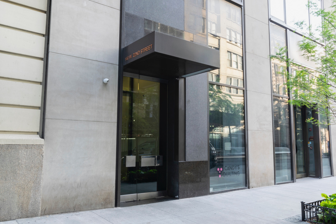 140 West 22nd Street, Unit 4C Manhattan, NY 10011 - Photo 12 of 16 a store room with a glass door