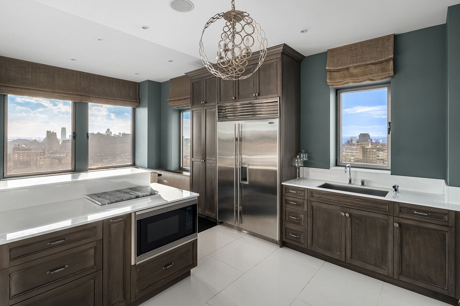 a kitchen with a sink and stove