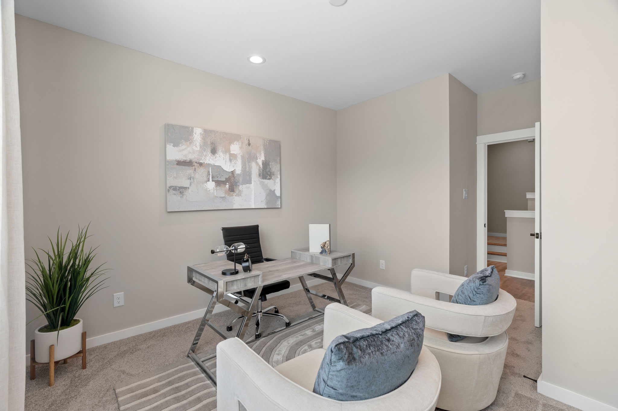 11303 Stonework Grv Lane Houston, TX 77076 - Photo 18 of 39 a work room with furniture and a potted plant