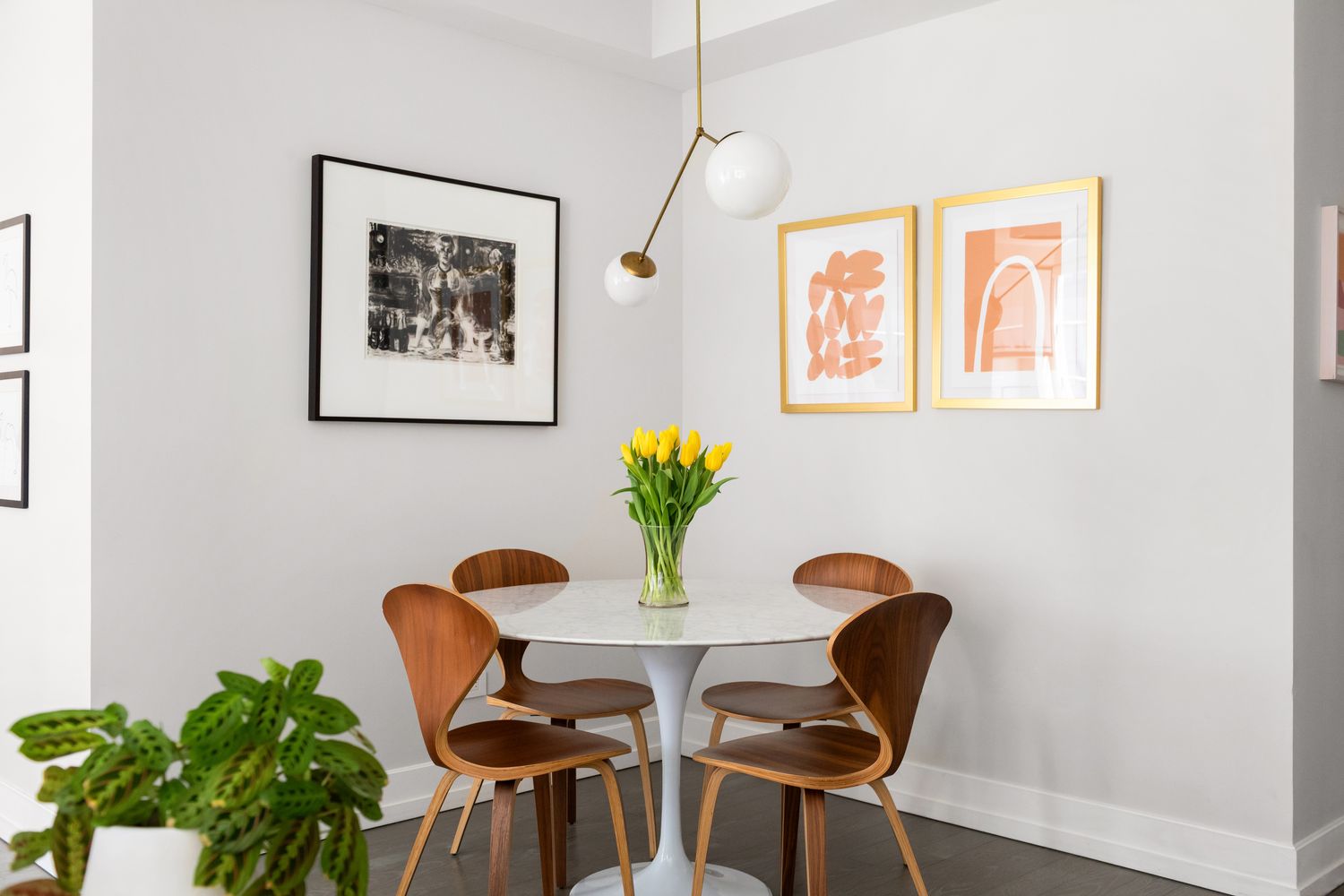 70 Charlton Street, Unit 19D Manhattan, NY 10014 - Photo 4 of 14 a view of a dining room with furniture and wooden floor