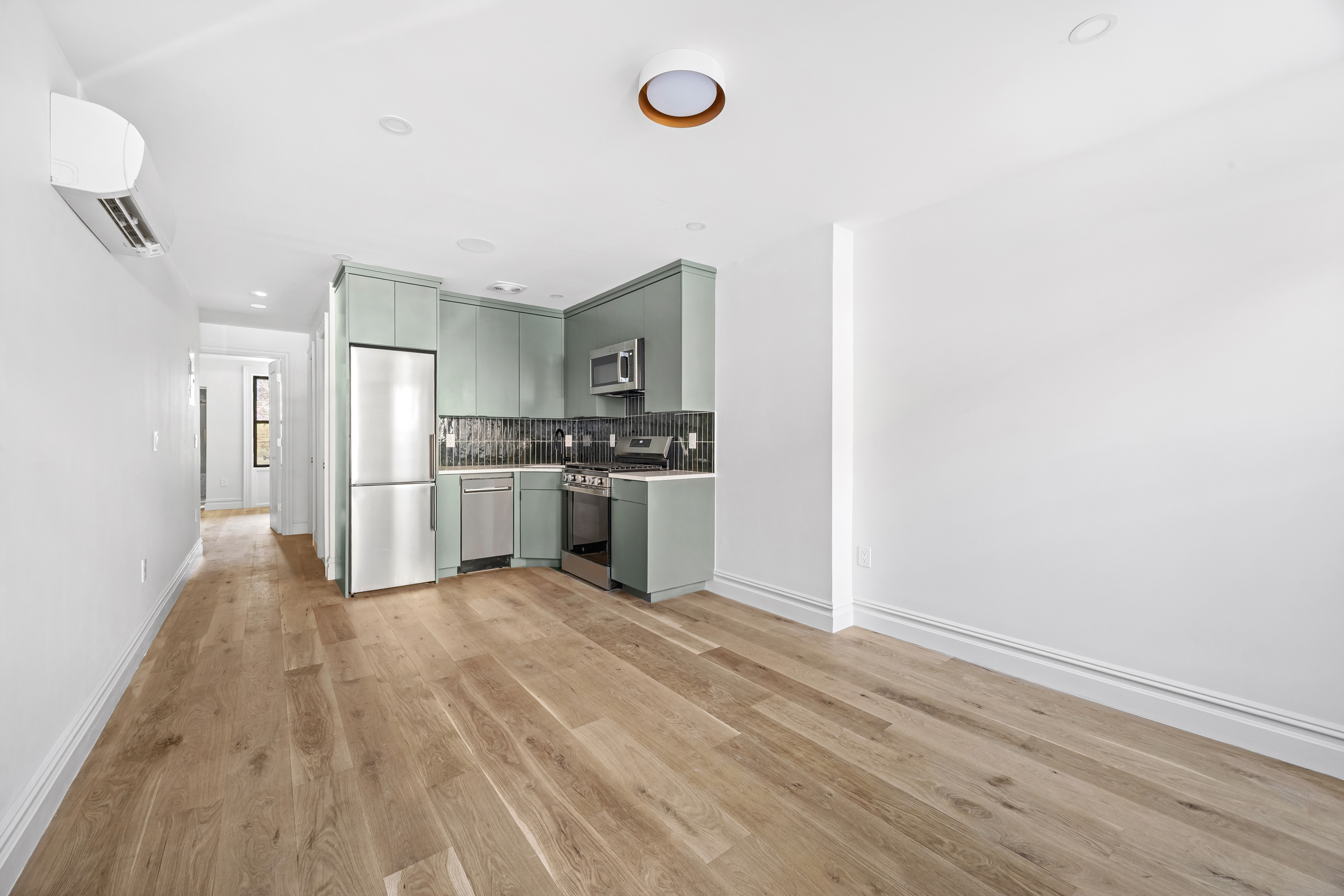 544 Madison Street, Unit A Brooklyn, NY 11221 - Photo 2 of 17 a view of kitchen with wooden floor