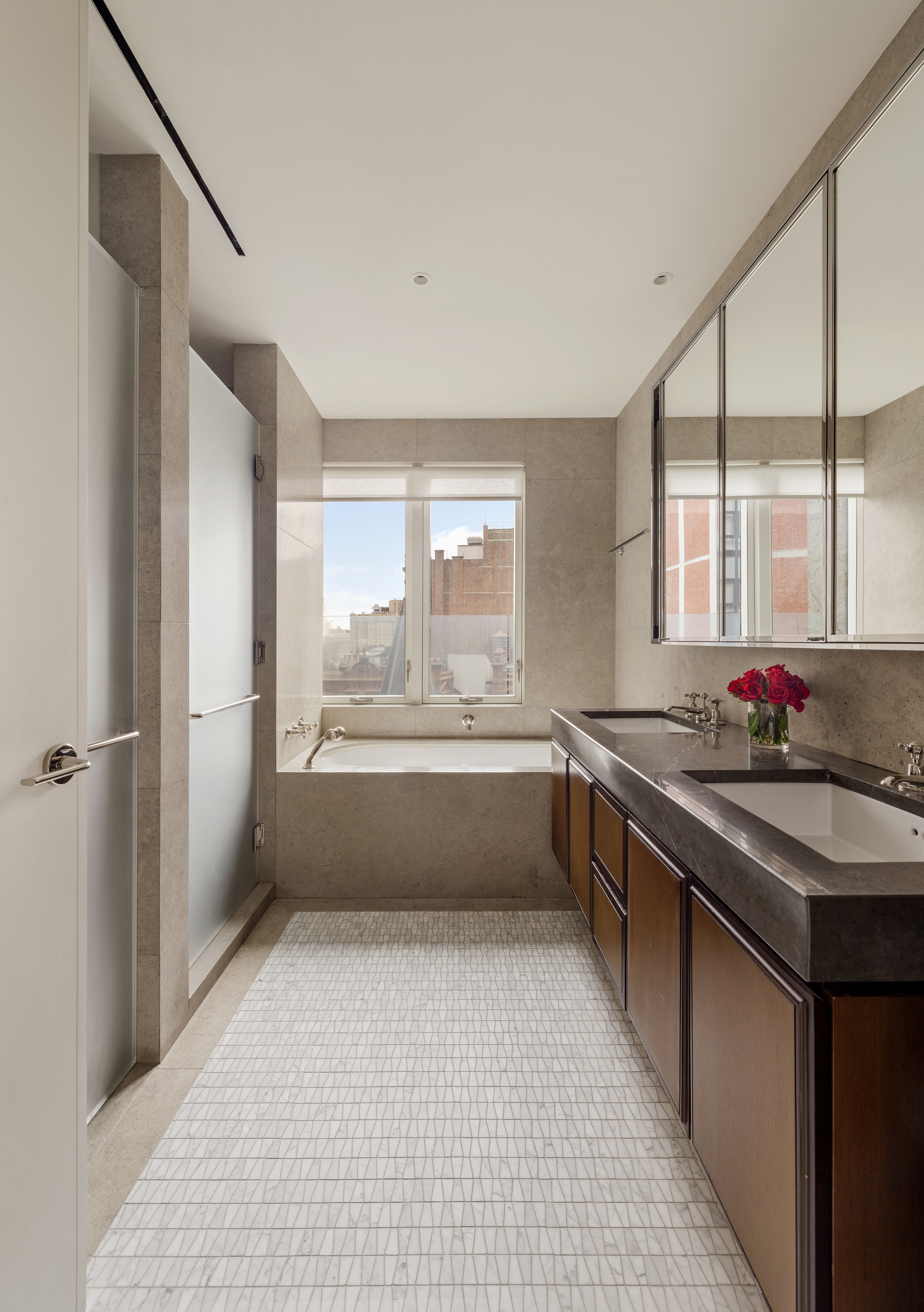 121 Nassau Street, Unit 17A Manhattan, NY 10038 - Photo 9 of 19 a large white kitchen with a large window