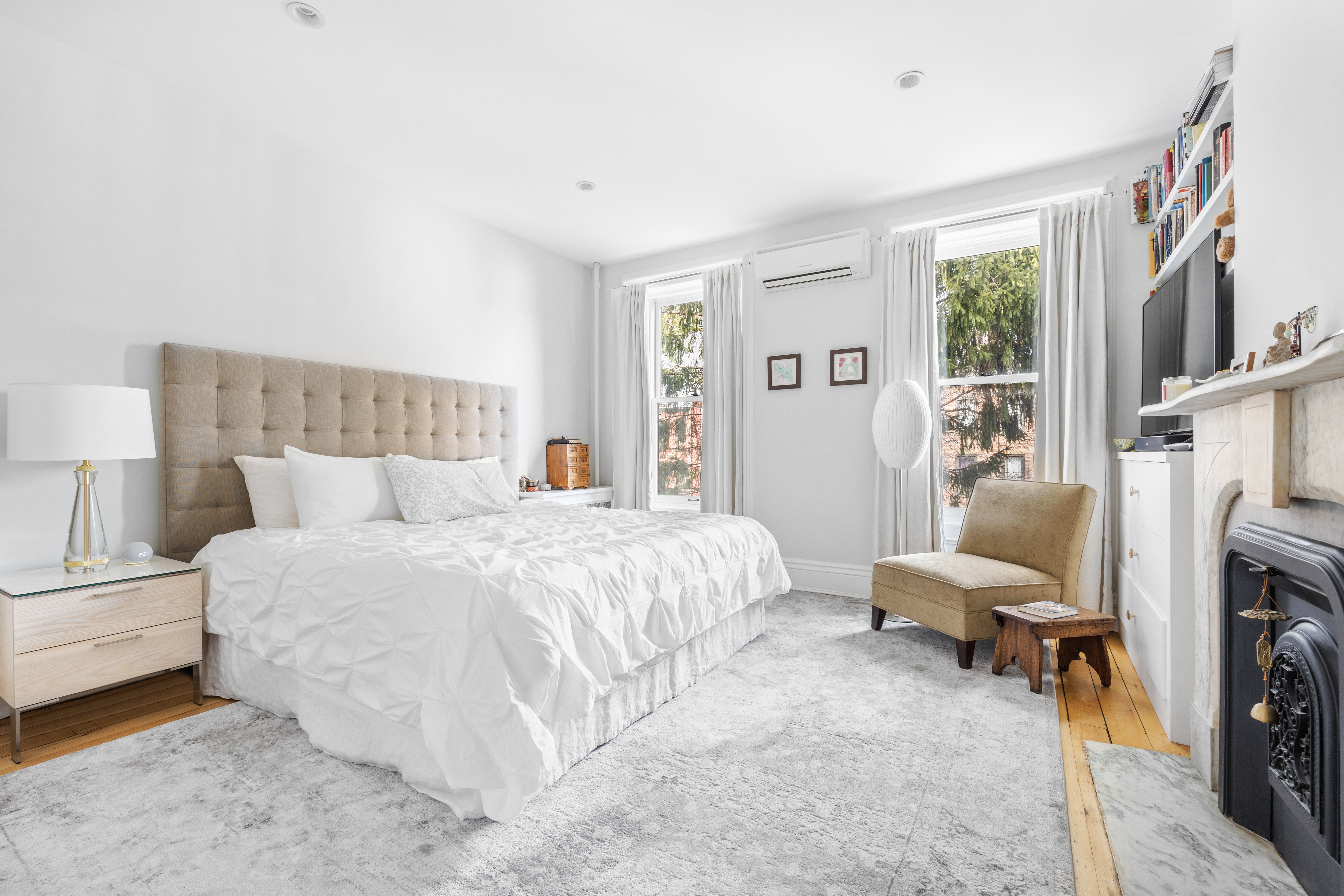 387 Union Street, Unit 2 Brooklyn, NY 11231 - Photo 6 of 12 a spacious bedroom with a bed and a couch