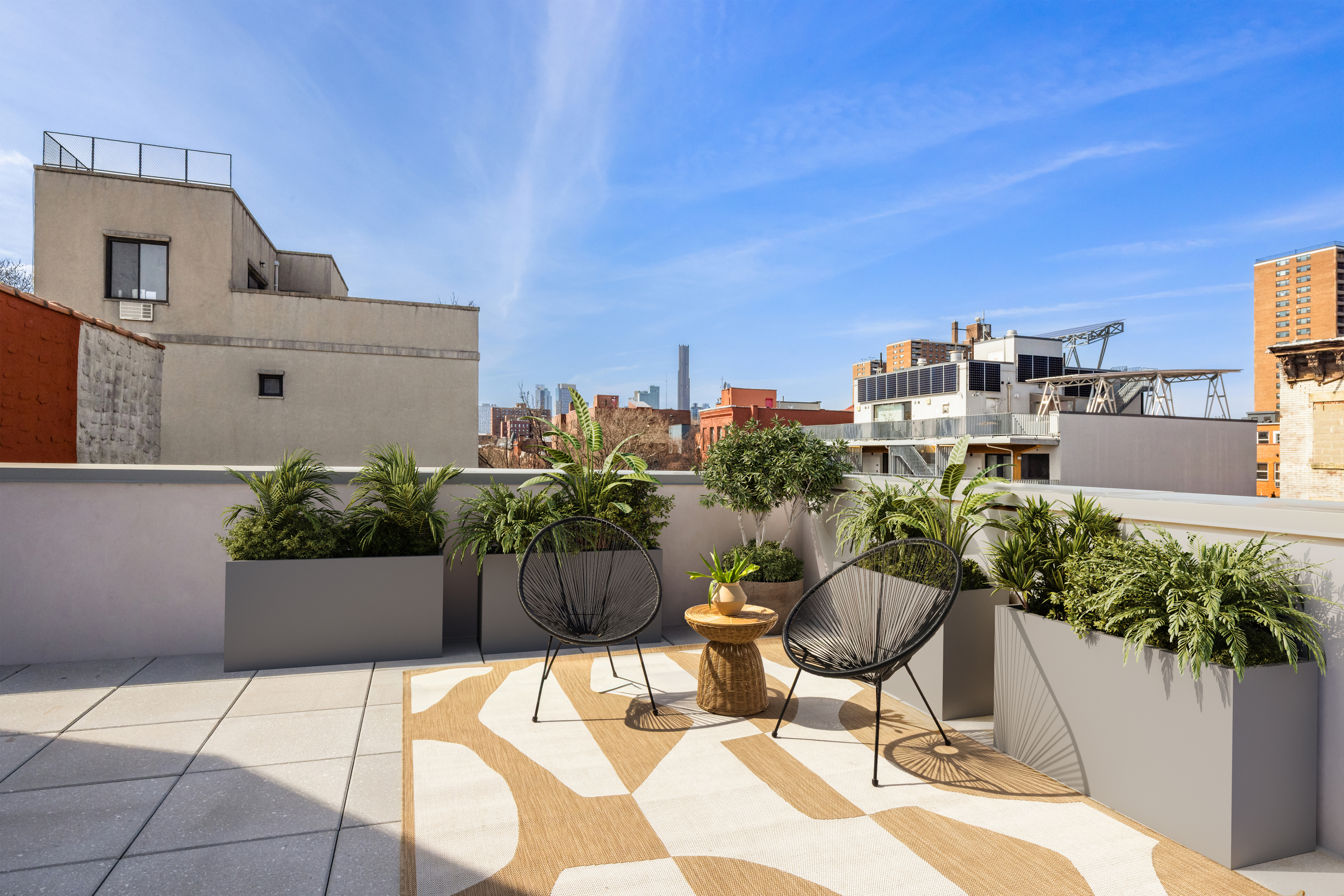272 Greene Avenue Brooklyn, NY 11238 - Photo 17 of 22 a view of a patio with plants and chairs